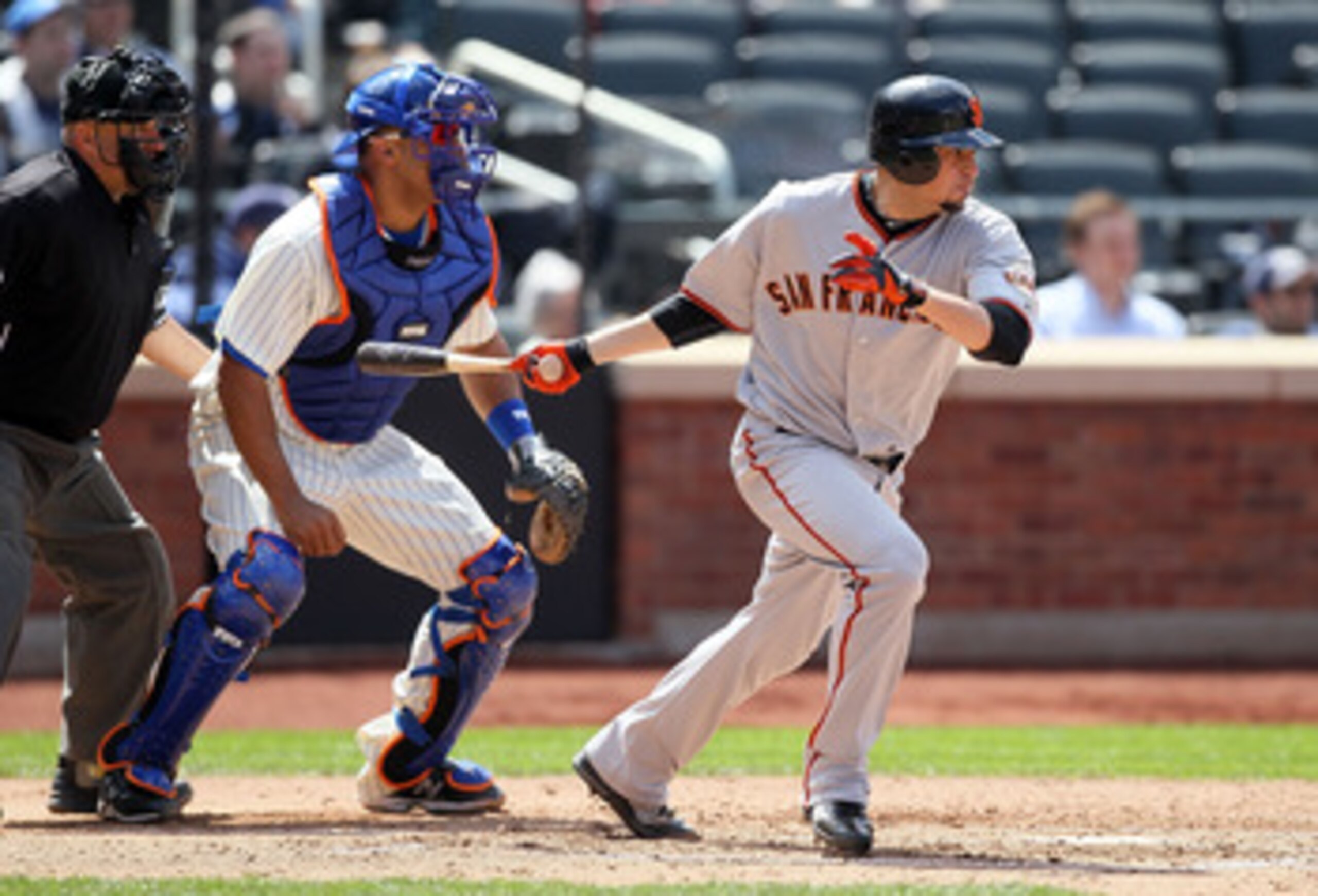 NEW YORK, NY - MAY 05:  Jonathan Sanchez #57 of the San Francisco Giants follows through on his fifth inning RBI single against the New York Mets on May 5, 2011 at Citi Field in the Flushing neighborhood of the Queens borough of New York City.  (Photo by 