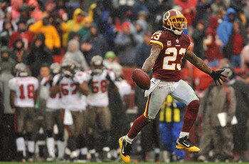 LANDOVER, MD - DECEMBER 12:  DeAngelo Hall #23 of the Washington Redskins celebrates a fumble recovery that lead to a touchdown against the Tampa Bay Buccaneers at FedExField on December 12, 2010 in Landover, Maryland. The Redskins lead the Buccaneers at 