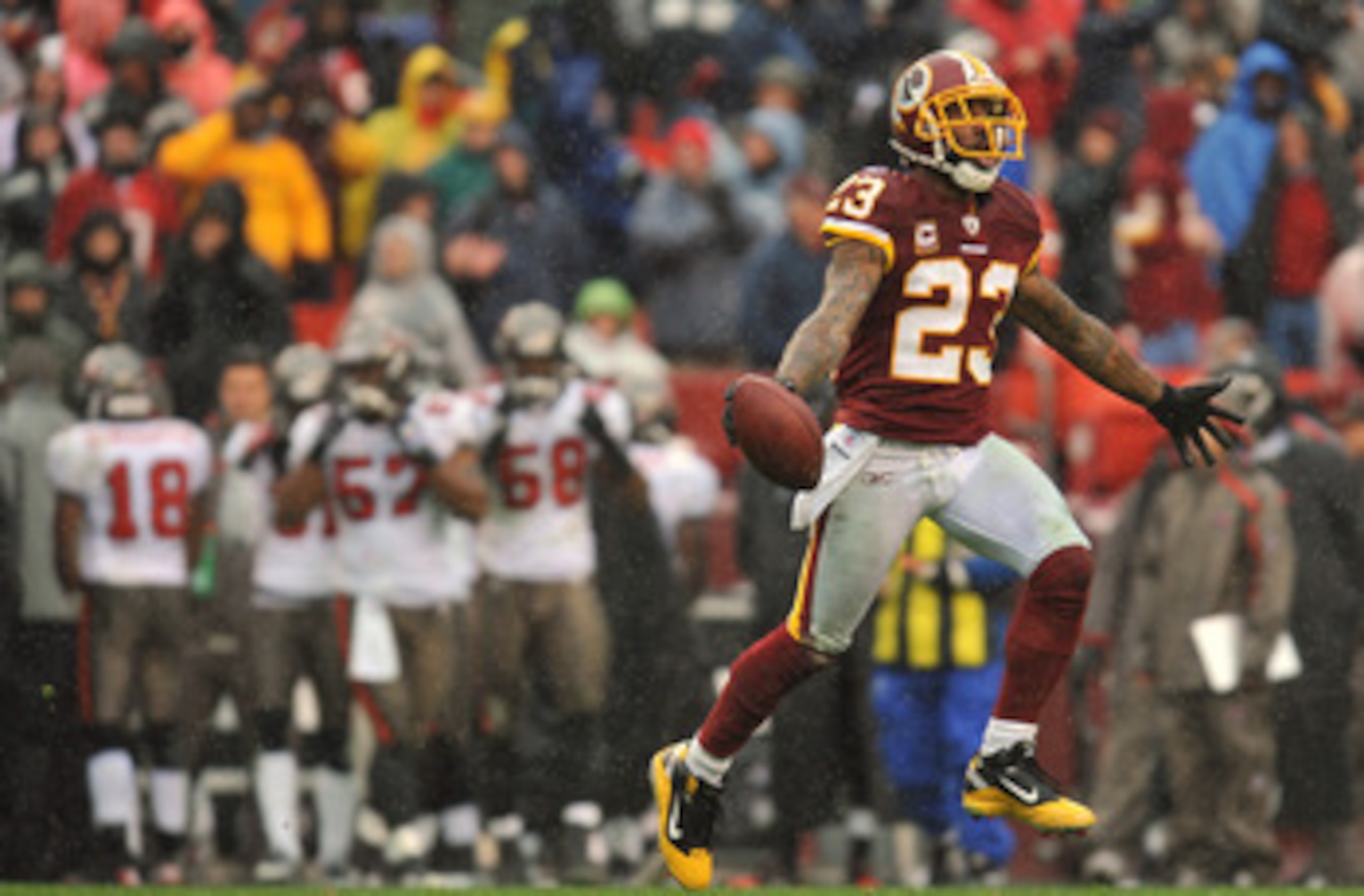 LANDOVER, MD - DECEMBER 12:  DeAngelo Hall #23 of the Washington Redskins celebrates a fumble recovery that lead to a touchdown against the Tampa Bay Buccaneers at FedExField on December 12, 2010 in Landover, Maryland. The Redskins lead the Buccaneers at 