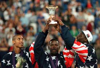 14 AUG 1994: REGGIE MILLER, JOE DUMARS AND LARRY JOHNSON CELEBRATE WITH THE TROPHY AS THE USA DREAM TEAM II DEFEATS RUSSIA 137-91 IN THE WORLD CHAMPIONSHIP FINAL AT THE SKYDOME STADIUM IN TORONTO, ONTARIO, CANADA. Mandatory Credit: Doug Pensinger/ALLSPO 14 AUG 1994: REGGIE MILLER, JOE DUMARS AND LARRY JOHNSON CELEBRATE WITH THE TROPHY AS THE USA DREAM TEAM II DEFEATS RUSSIA 137-91 IN THE WORLD CHAMPIONSHIP FINAL AT THE SKYDOME STADIUM IN TORONTO, ONTARIO, CANADA. Mandatory Credit: Doug Pensinger/ALLSPO