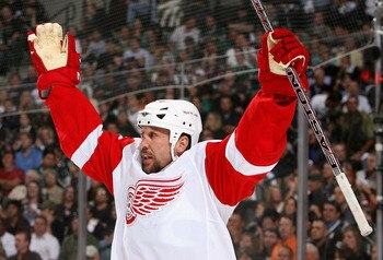 DALLAS - MAY 19:  Dallas Drake #17 of the Detroit Red Wings celebrates after scoring a first period goal against the Dallas Stars during game six of the Western Conference Finals of the 2008 NHL Stanley Cup Playoffs at American Airlines Center on May 19, 