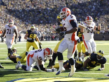 ANN ARBOR, MI - NOVEMBER 06:  Mikel Leshoure of the Illinios Fighting Illini scores a triple overtime touchdown while playing the Michigan Wolverines at Michigan Stadium on November 6, 2010 in Ann Arbor, Michigan. Michigan won the game 67-65. (Photo by Gr