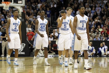 NEWARK, NJ - MARCH 27:  Leslie McDonald #2, Harrison Barnes #40, Kendall Marshall #5, Tyler Zeller #44 and Dexter Strickland #1 of the North Carolina Tar Heels walks of the court after being defeated by the Kentucky Wildcats in the east regional final of
