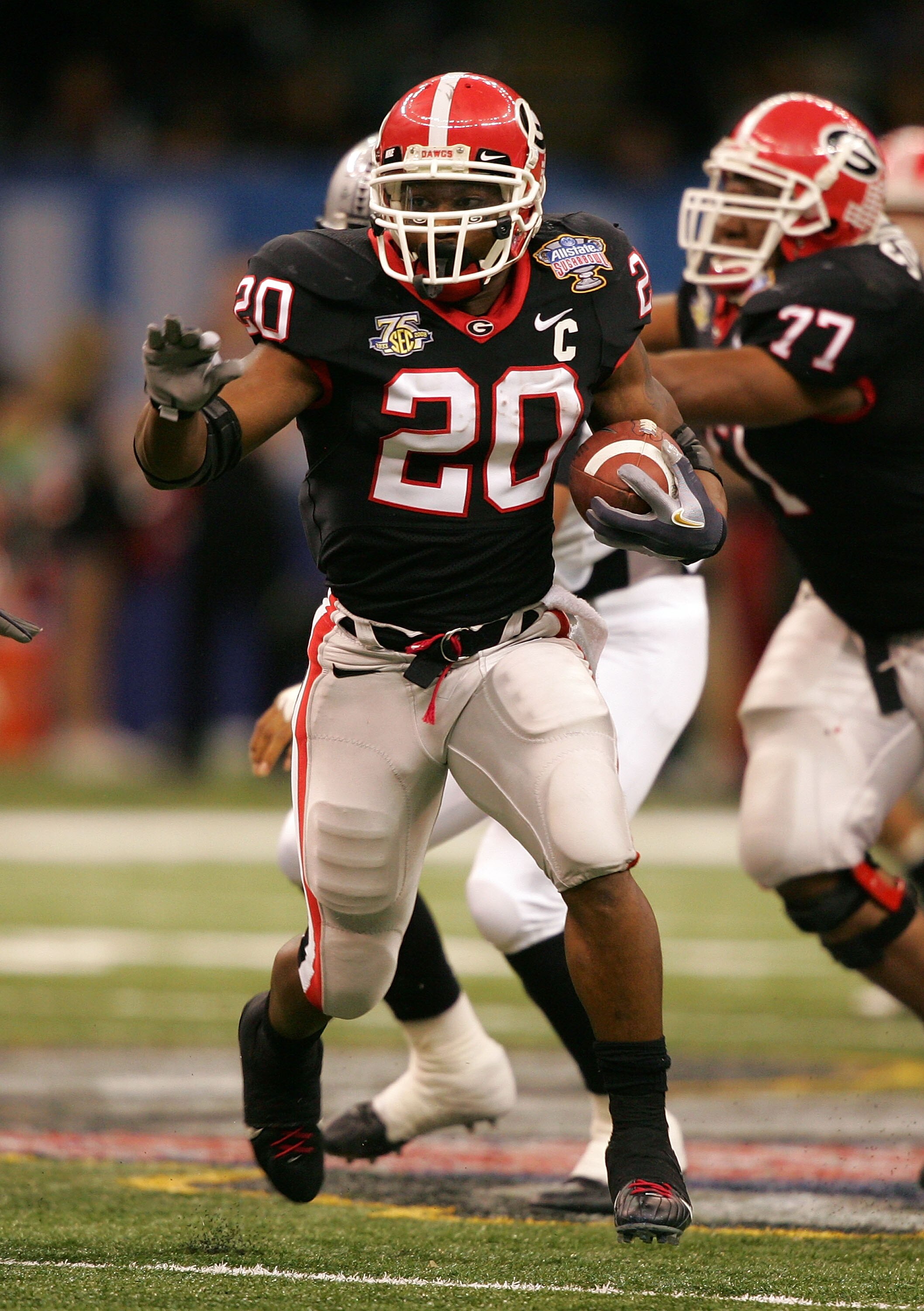 NEW ORLEANS - JANUARY 01:  Thomas Brown #20 of the Georgia Bulldogs runs the ball against the Hawai'i Warriors during the Allstate Sugar Bowl at the Louisiana Superdome on January 1, 2008 in New Orleans, Louisiana.  (Photo by Matthew Stockman/Getty Images