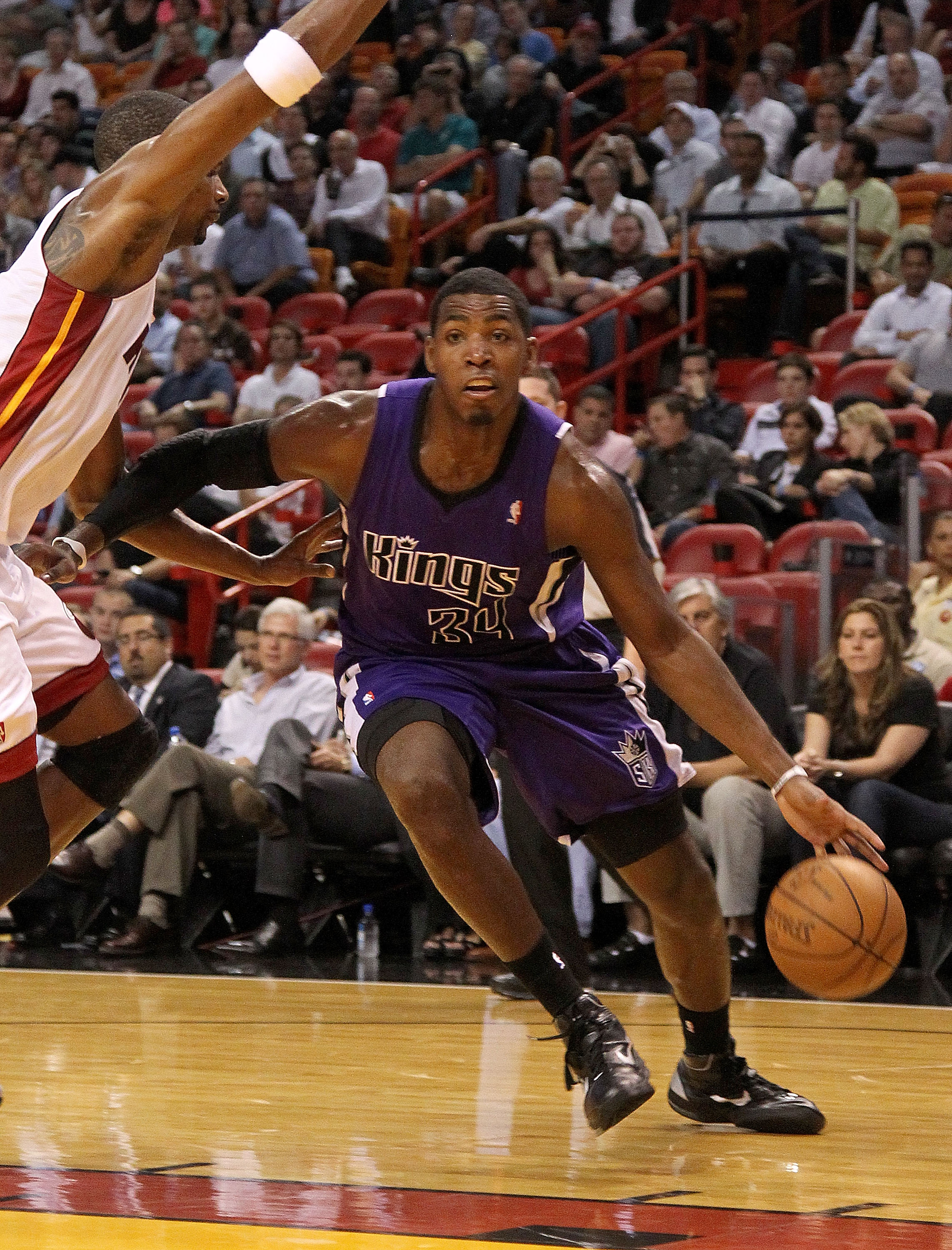 MIAMI, FL - FEBRUARY 22:  Jason Thompson #34 of the Sacramento Kings dribbles during a game against the Miami Heat at American Airlines Arena on February 22, 2011 in Miami, Florida. NOTE TO USER: User expressly acknowledges and agrees that, by downloading