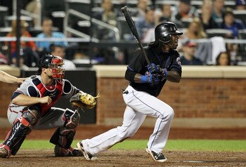 NEW YORK, NY - JUNE 05:  Jose Reyes #7 of the New York Mets follows through on his fourth inning RBI double against the Atlanta Braves on June 5, 2011 at Citi Field in the Flushing neighborhood of the Queens borough of New York City.  (Photo by Jim McIsaa