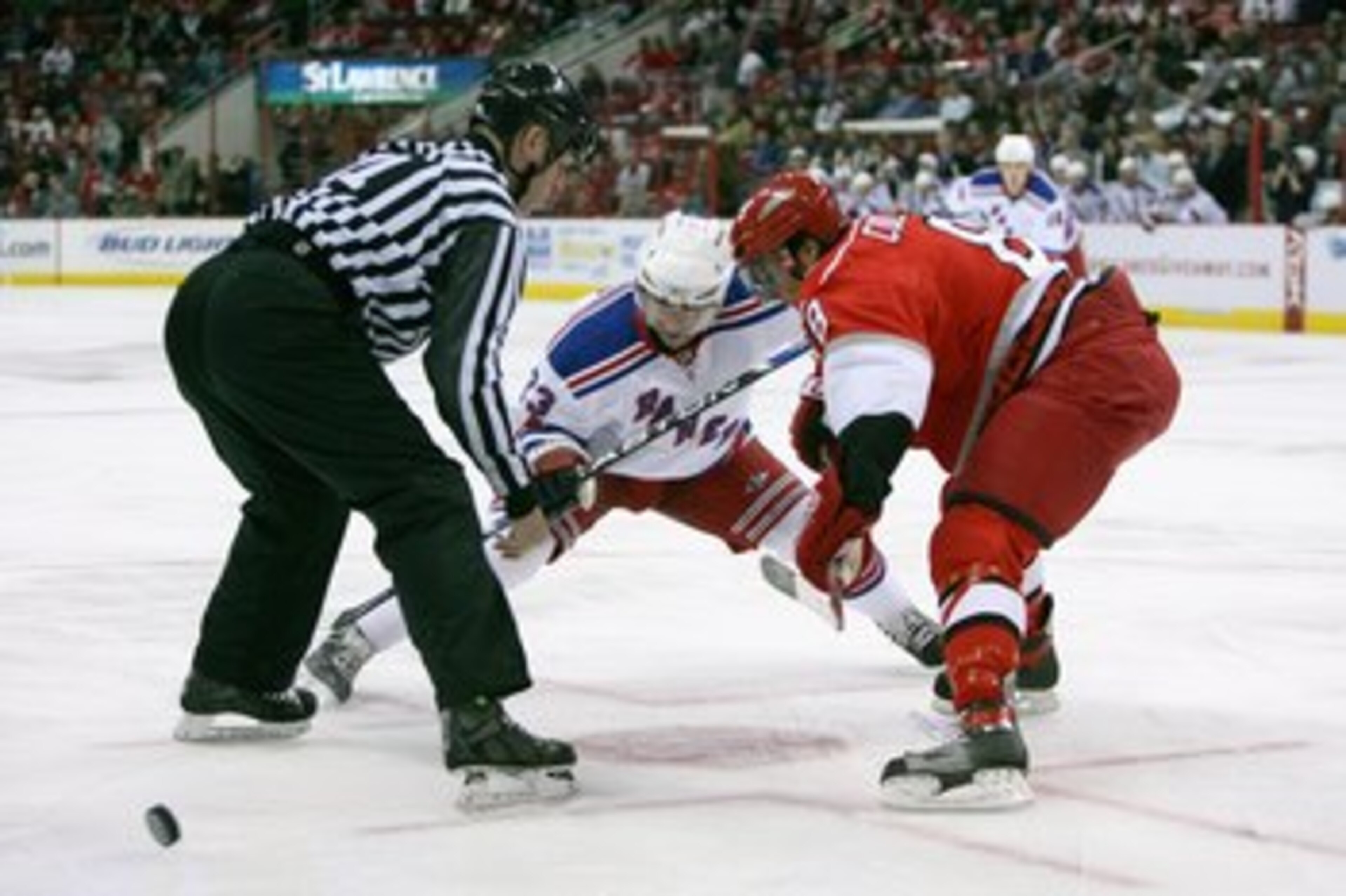 RALEIGH, NC - FEBRUARY 28: Chris Drury #23 of the New York Rangers takes the faceoff against Matt Cullen #8 of the Carolina Hurricanes during their NHL game at RBC Center on February 28, 2008 in Raleigh, North Carolina. The Rangers defeated the Hurricane RALEIGH, NC - FEBRUARY 28: Chris Drury #23 of the New York Rangers takes the faceoff against Matt Cullen #8 of the Carolina Hurricanes during their NHL game at RBC Center on February 28, 2008 in Raleigh, North Carolina. The Rangers defeated the Hurricane