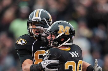 COLUMBIA, MO - NOVEMBER 13:  Michael Egnew #82  of the Missouri Tigers congratulates T.J.Moe #28 with a chest bump after Moe scored a touchdown during the game against the Kansas State Wildcats on November 13, 2010 at Faurot Field/Memorial Stadium in Colu