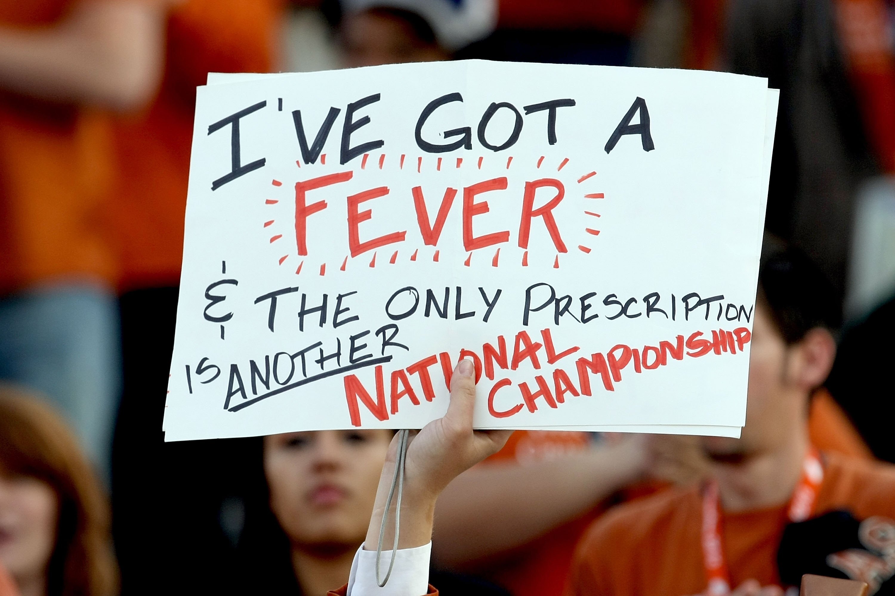 PASADENA, CA - JANUARY 07:  Fans hold a sign prior to the Citi BCS National Championship game between the Texas Longhorns and the Alabama Crimson Tide at the Rose Bowl on January 7, 2010 in Pasadena, California.  (Photo by Stephen Dunn/Getty Images)