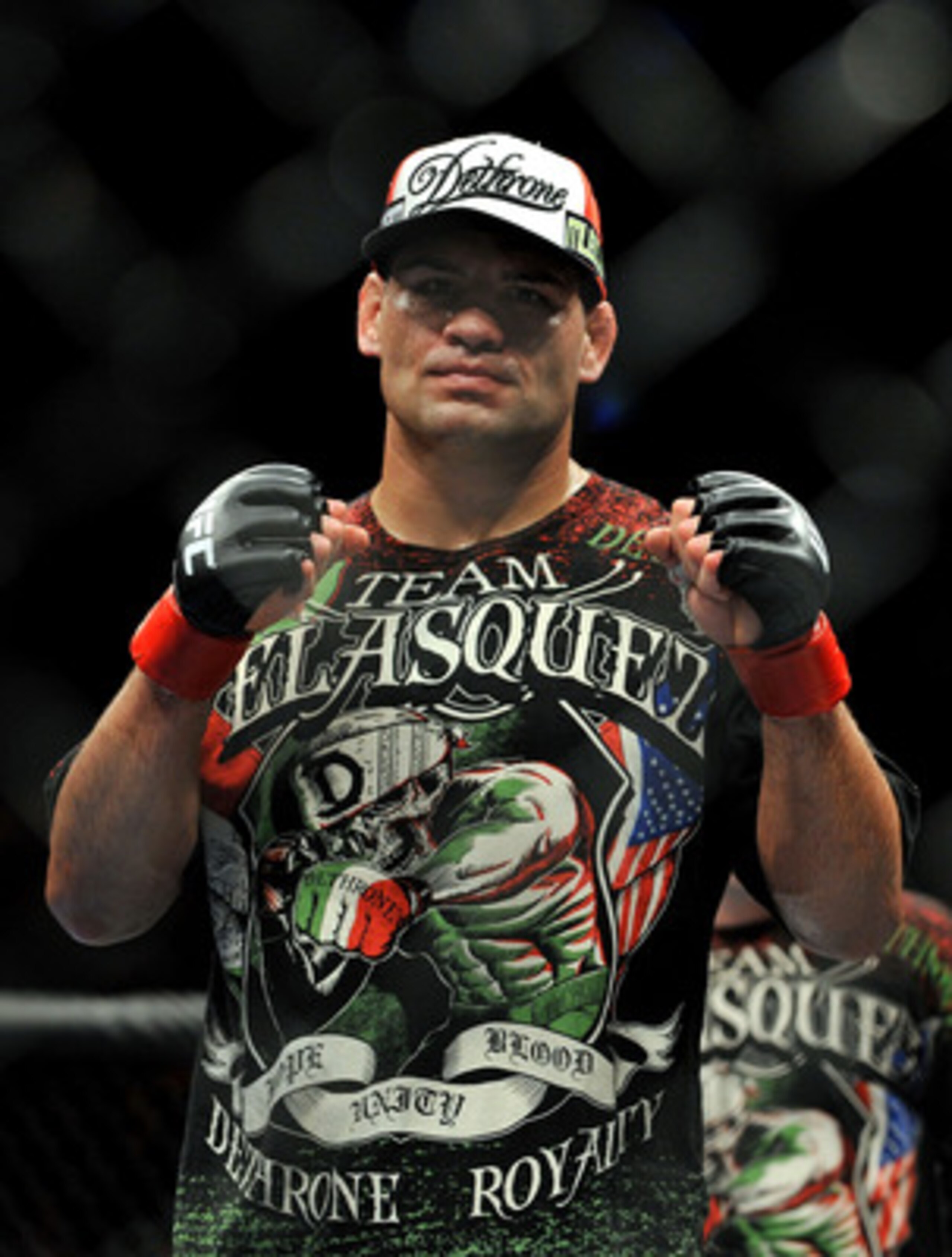 LOS ANGELES, CA - OCTOBER 24: UFC fighter Cain Velasquez poses after his victory over UFC fighter Ben Rothwell (not pictured) in their Heavyweight bout at UFC 104: Machida vs. Shogun at Staples Center on October 24, 2009 in Los Angeles, California. Vela LOS ANGELES, CA - OCTOBER 24: UFC fighter Cain Velasquez poses after his victory over UFC fighter Ben Rothwell (not pictured) in their Heavyweight bout at UFC 104: Machida vs. Shogun at Staples Center on October 24, 2009 in Los Angeles, California. Vela