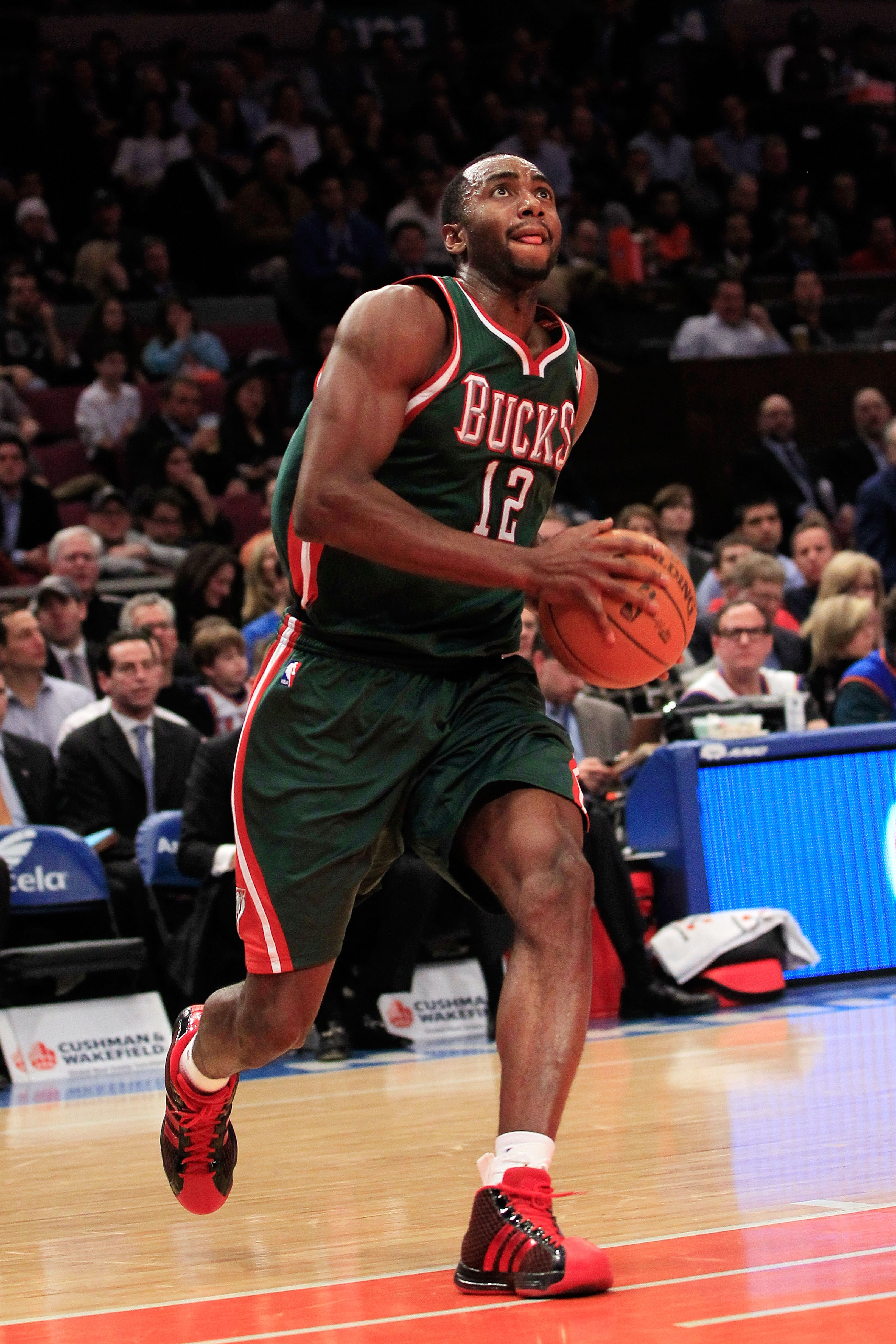 NEW YORK, NY - FEBRUARY 23: Luc Mbah a Moute #12 of the Milwaukee Bucks goes up to the basket against the New York Knicks at Madison Square Garden on February 23, 2011 in New York City. NOTE TO USER: User expressly acknowledges and agrees that, by downloa