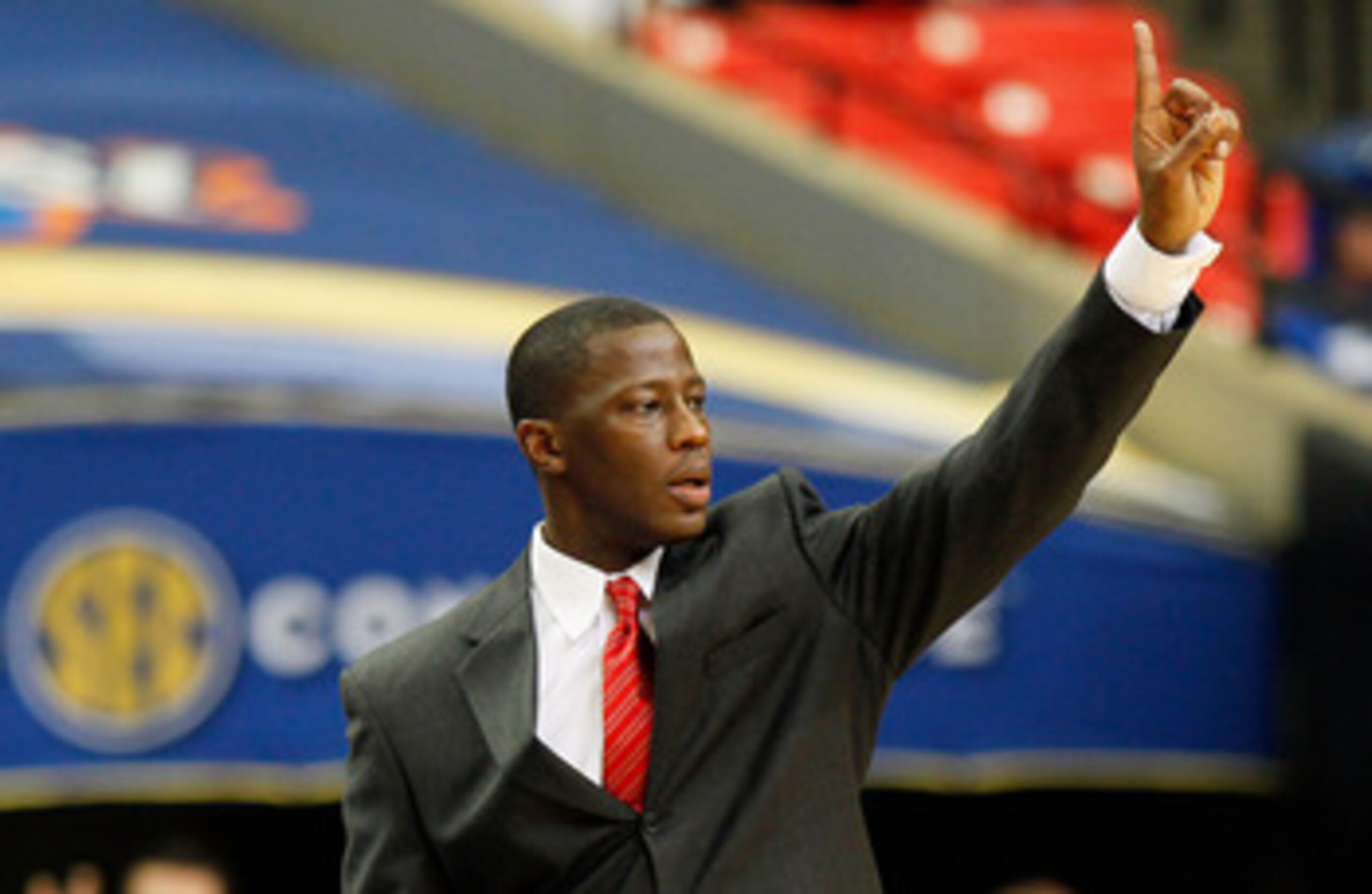 ATLANTA, GA - MARCH 12:  Head coach Anthony Grant of the Alabama Crimson Tide coaches against the Kentucky Wildcats during the semifinals of the SEC Men's Basketball Tournament at Georgia Dome on March 12, 2011 in Atlanta, Georgia.  (Photo by Kevin C. Cox