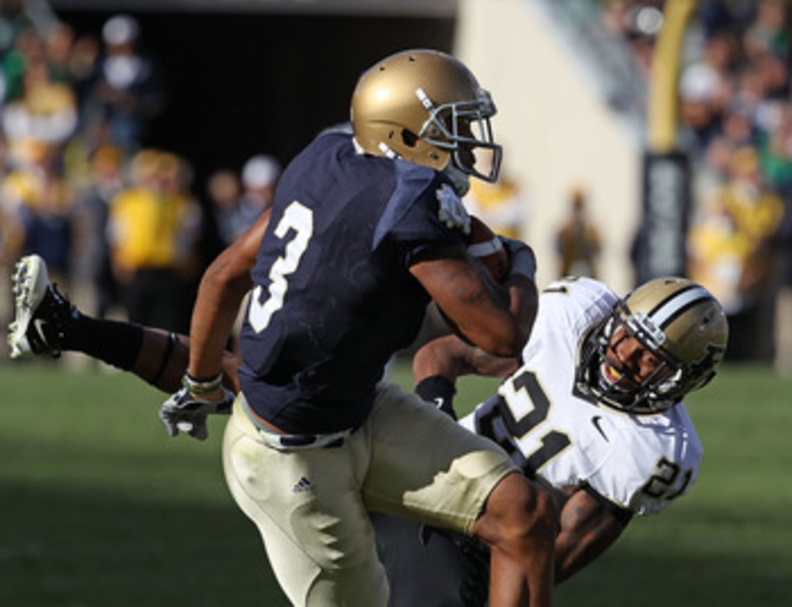 SOUTH BEND, IN - SEPTEMBER 04: Michael Floyd #3 of the Notre Dame Fighting Irish makes a catch under pressure from Ricardo Allen #21 of the Purdue Boilermakers at Notre Dame Stadium on September 4, 2010 in South Bend, Indiana. Notre Dame defeated Purdue 2