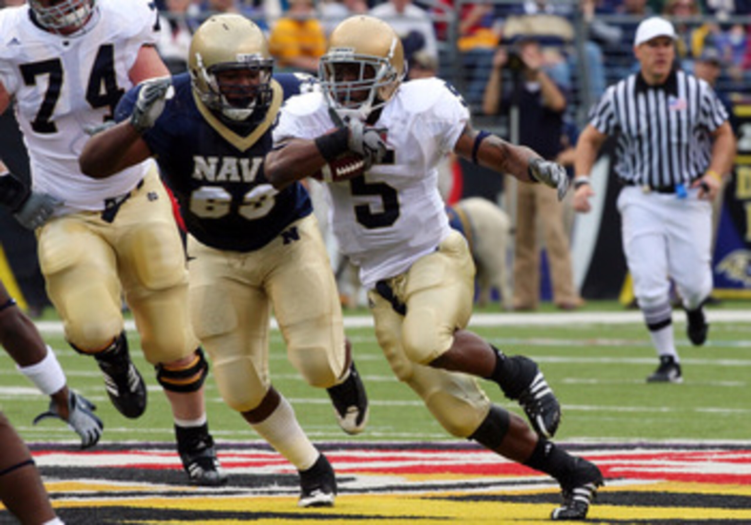 BALTIMORE - NOVEMBER 15:  Allen Armando #5 of the Notre Dame Fighting Irish runs the ball against Jordan Stephens #69 of the Navy Midshipmen on November 15, 2008 at M&T Bank Stadium in Baltimore, Maryland. Notre Dame defeated Navy 27-21.  (Photo by Jim Mc