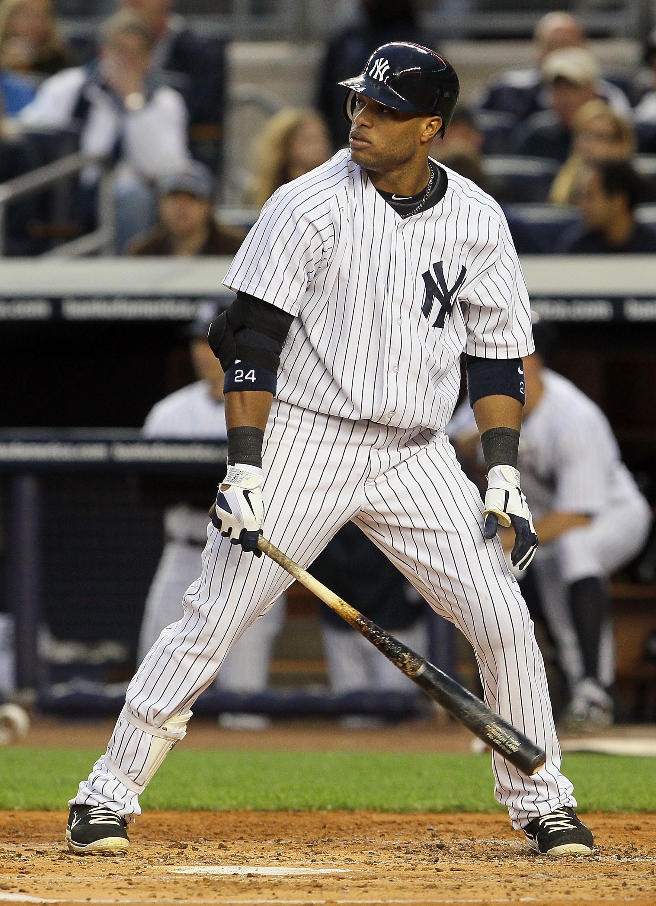 NEW YORK, NY - MAY 14:  Robinson Cano #24 of the New York Yankees bats against the Boston Red Sox on May 14, 2011 at Yankee Stadium in the Bronx borough of New York City.  (Photo by Jim McIsaac/Getty Images)