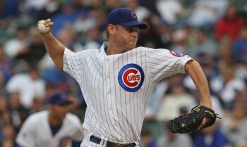 CHICAGO, IL - MAY 29: Kerry Wood #34 of the Chicago Cubs delivers the ball against the Pittsburgh Pirates at Wrigley Field on May 29, 2011 in Chicago, Illinois. The Cubs defeated the Pirates 3-2.  (Photo by Jonathan Daniel/Getty Images)