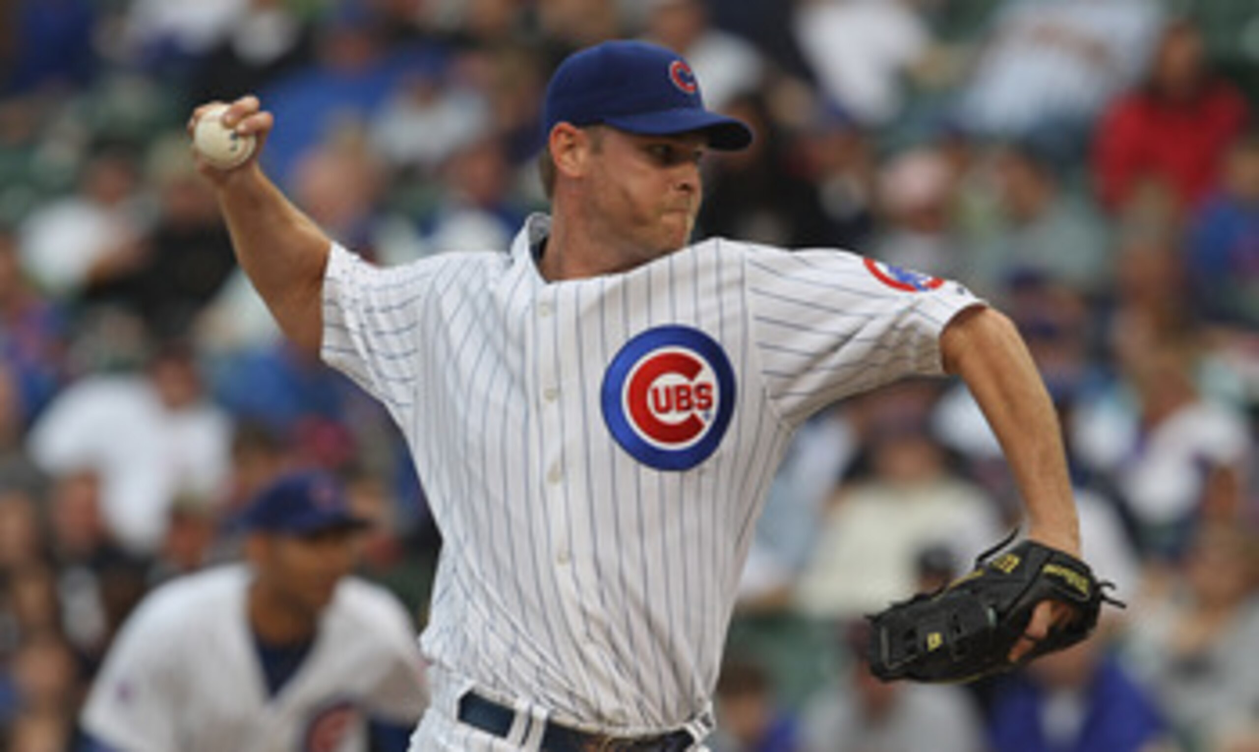 CHICAGO, IL - MAY 29: Kerry Wood #34 of the Chicago Cubs delivers the ball against the Pittsburgh Pirates at Wrigley Field on May 29, 2011 in Chicago, Illinois. The Cubs defeated the Pirates 3-2.  (Photo by Jonathan Daniel/Getty Images)