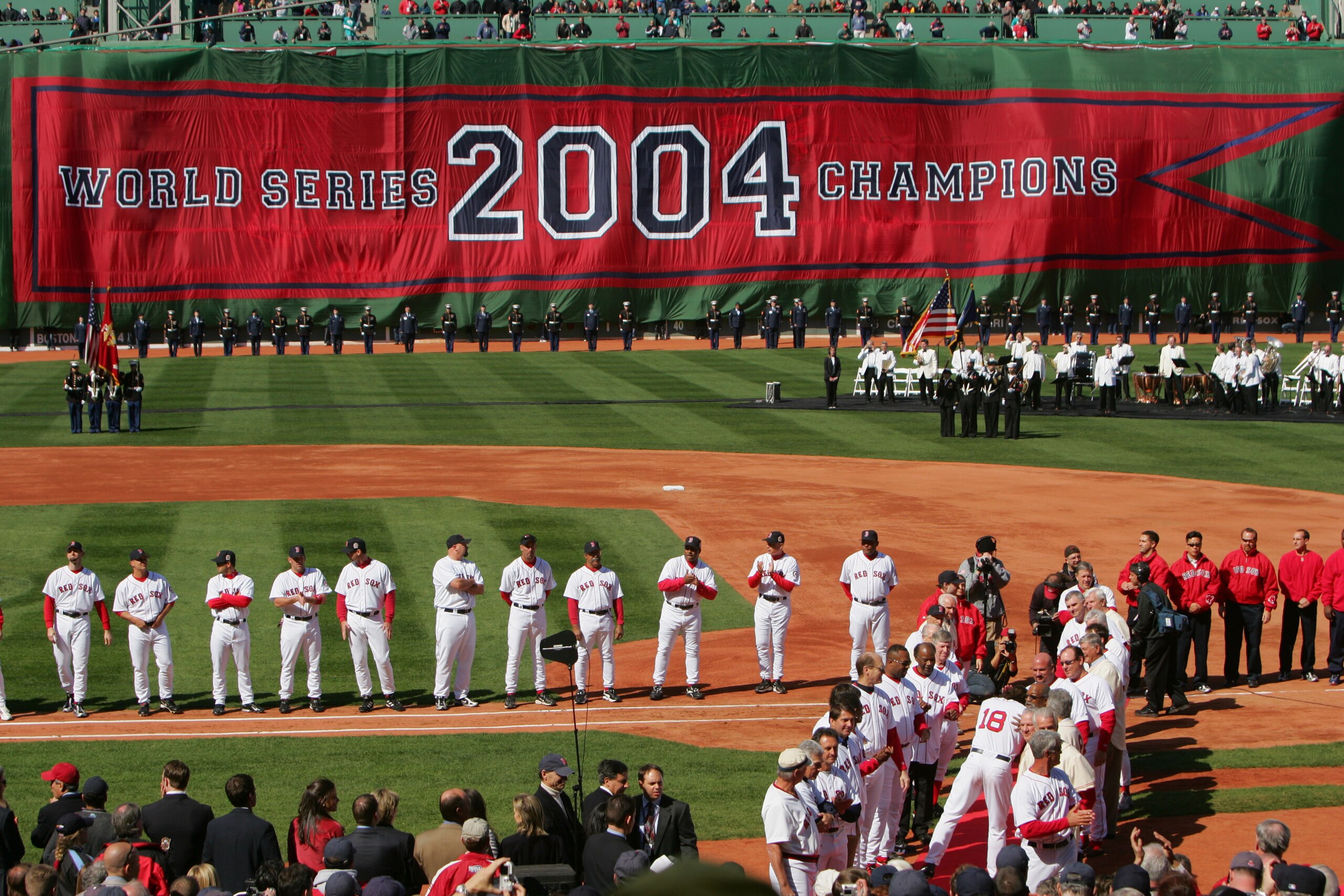 BOSTON - APRIL 11:  The Boston Red Sox celebrate their 2004 World Series Championship during a pre-game ceremony prior to the game against the New York Yankees at Fenway Park on April 11, 2005 in Boston, Massachusetts. The Red Sox won 8-1.  (Photo by Ezra