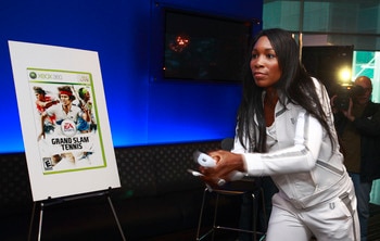 BURNABY, CANADA - JULY 13: In this photo provided by EA Sports, Tennis star Venus Williams plays Grand Slam Tennis on the Wii during the EA Sports King of the Court competition July 13, 2009 in Burnaby, Canada.  Dwight Howard and Venus Williams participte
