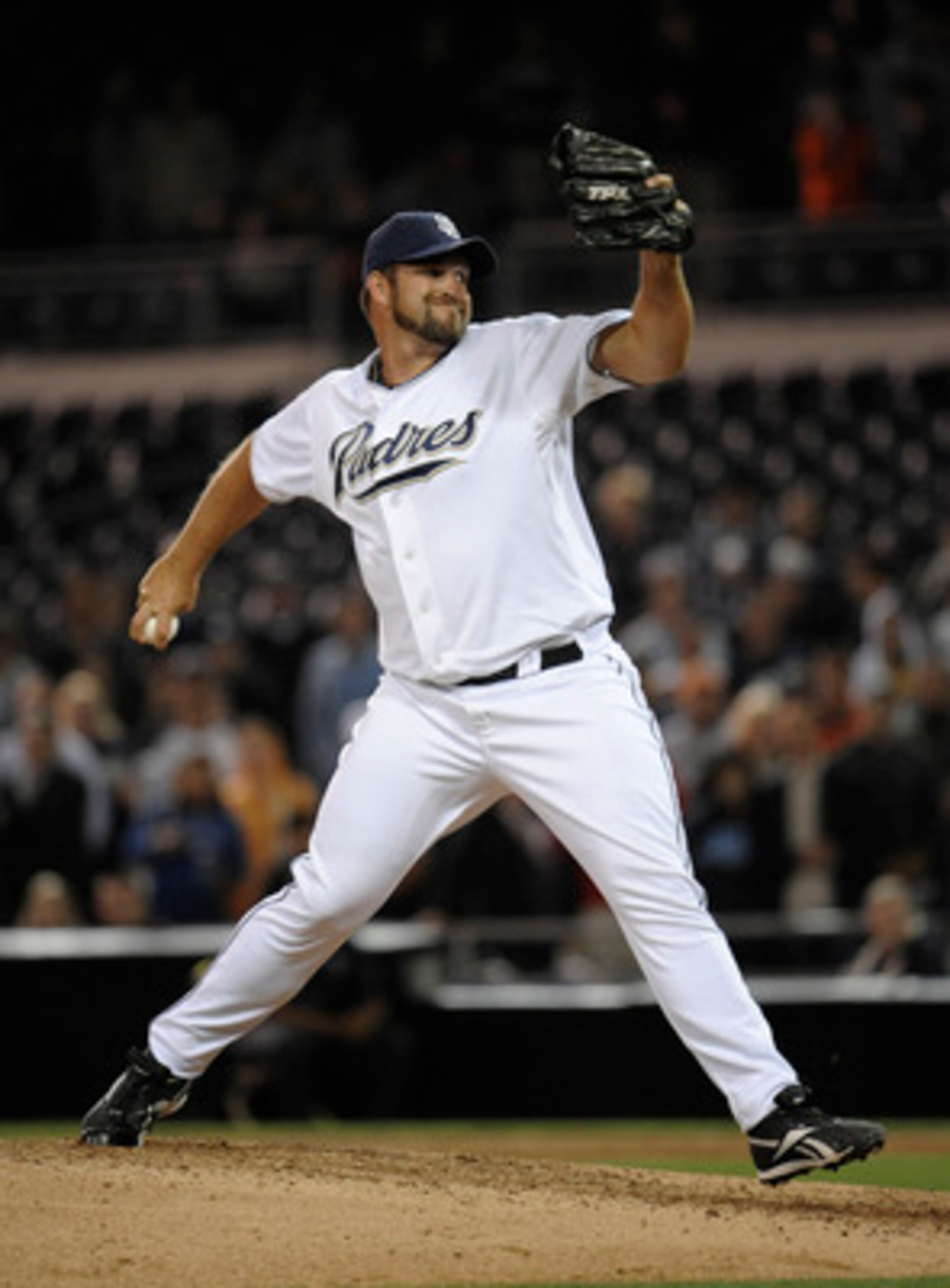 SAN DIEGO, CA - JUNE 7: Heath Bell #21 of the San Diego Padres pitches during the ninth inning of a baseball game against the Colorado Rockies at Petco Park on June 7, 2011 in San Diego, California.  (Photo by Denis Poroy/Getty Images)