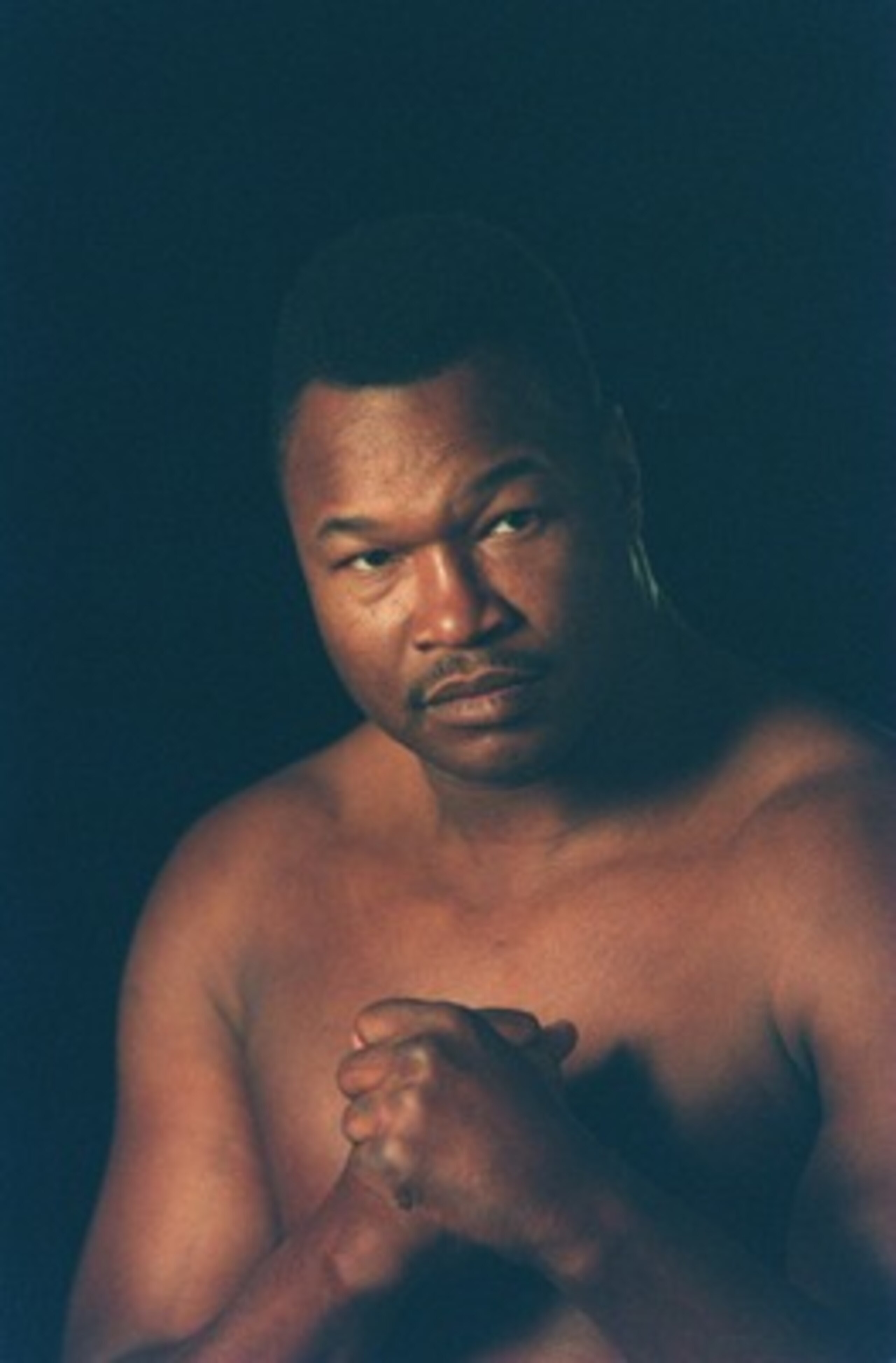 29 Nov 1994: Heavyweight Boxer Larry Holmes poses during a photo shoot. Mandatory Credit: Holly Stein/ALLSPORT 29 Nov 1994: Heavyweight Boxer Larry Holmes poses during a photo shoot. Mandatory Credit: Holly Stein/ALLSPORT