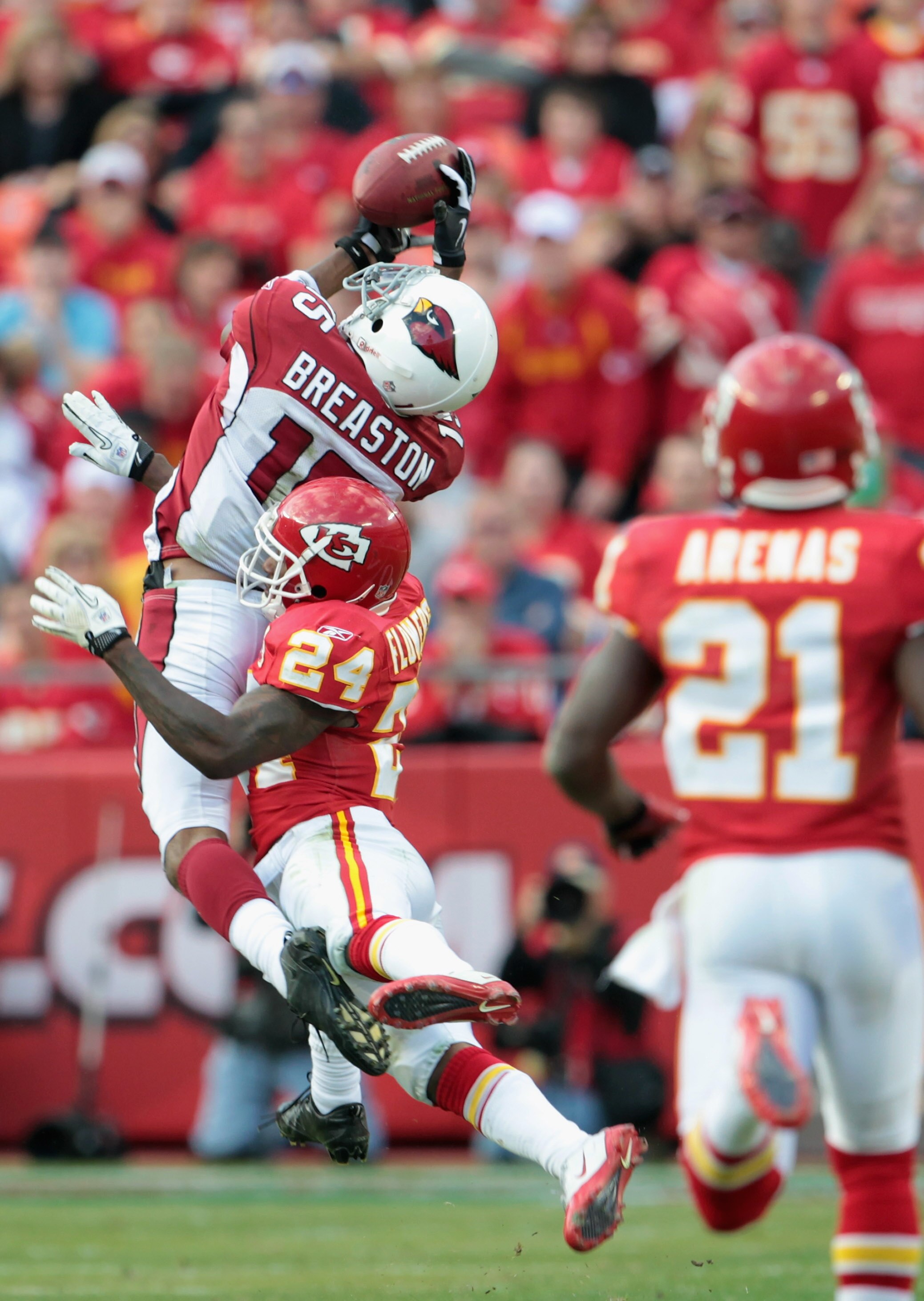 KANSAS CITY, MO - NOVEMBER 21: Receiver Steve Breaston #15 of the Arizona Cardinals makes a catch as Brandon Flowers #24 of the Kansas City Chiefs defends during the game on November 21, 2010 at Arrowhead Stadium in Kansas City, Missouri. (Photo by Jami KANSAS CITY, MO - NOVEMBER 21: Receiver Steve Breaston #15 of the Arizona Cardinals makes a catch as Brandon Flowers #24 of the Kansas City Chiefs defends during the game on November 21, 2010 at Arrowhead Stadium in Kansas City, Missouri. (Photo by Jami