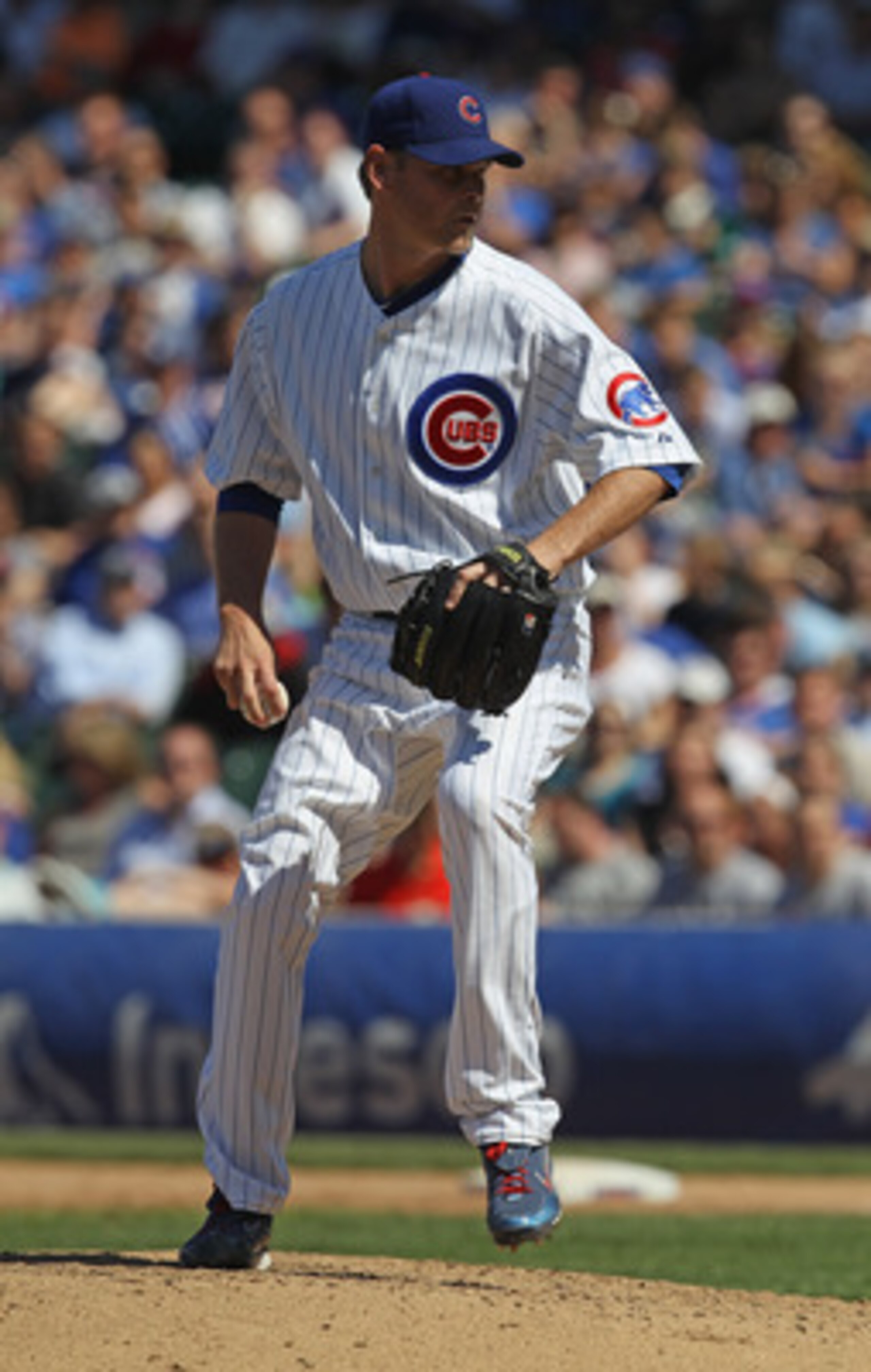 CHICAGO, IL - JUNE 01:  Kerry Wood #34 of the Chicago Cubs pitches against the Houston Astros at Wrigley Field on June 1, 2011 in Chicago, Illinois. The Astros defeated the Cubs 3-1.  (Photo by Jonathan Daniel/Getty Images)