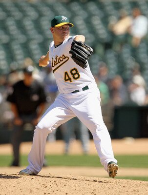 OAKLAND, CA - MAY 02:  Michael Wuertz #48 of the Oakland Athletics in action against the Texas Rangers at Oakland-Alameda County Coliseum on May 2, 2011 in Oakland, California.  (Photo by Ezra Shaw/Getty Images)