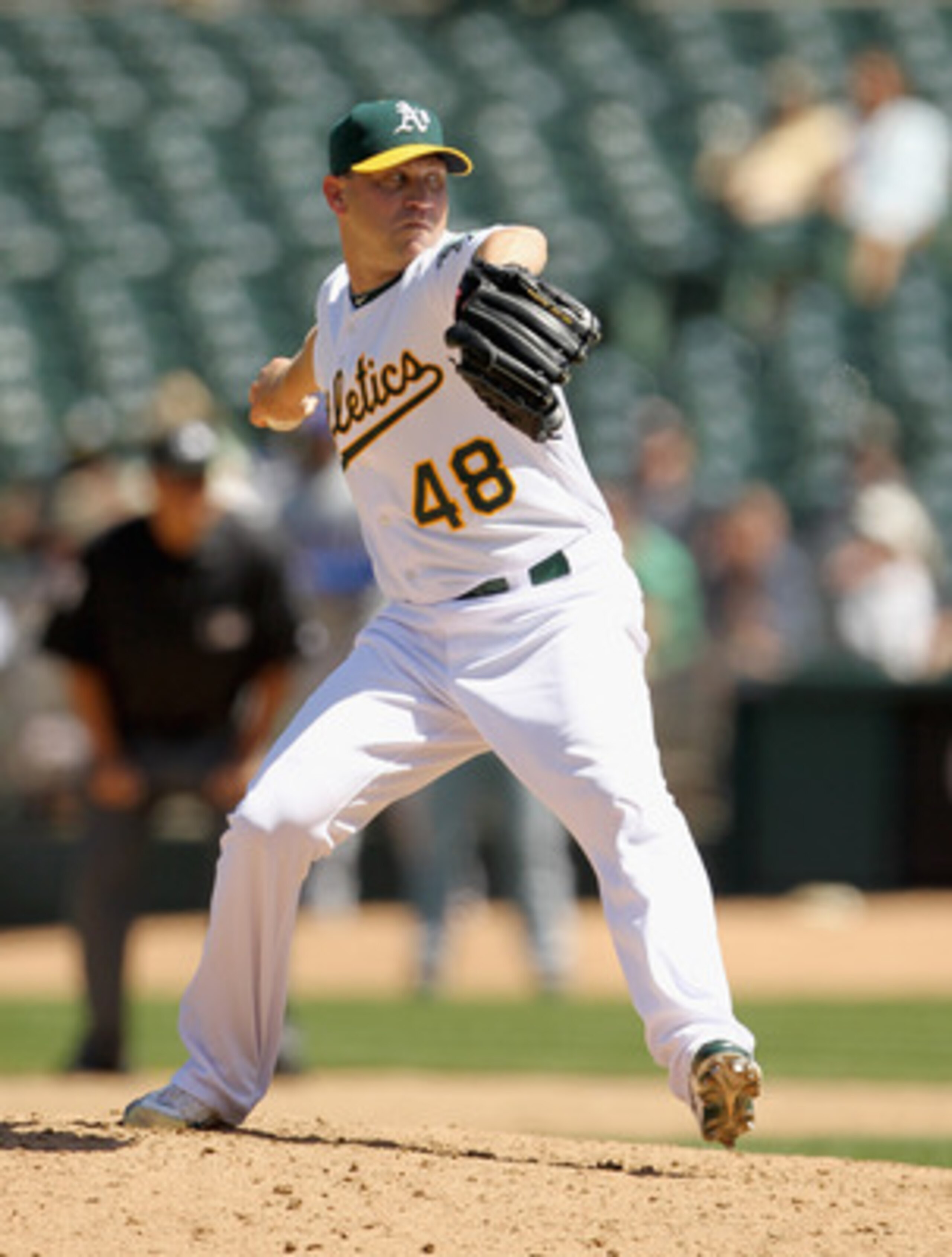 OAKLAND, CA - MAY 02:  Michael Wuertz #48 of the Oakland Athletics in action against the Texas Rangers at Oakland-Alameda County Coliseum on May 2, 2011 in Oakland, California.  (Photo by Ezra Shaw/Getty Images)