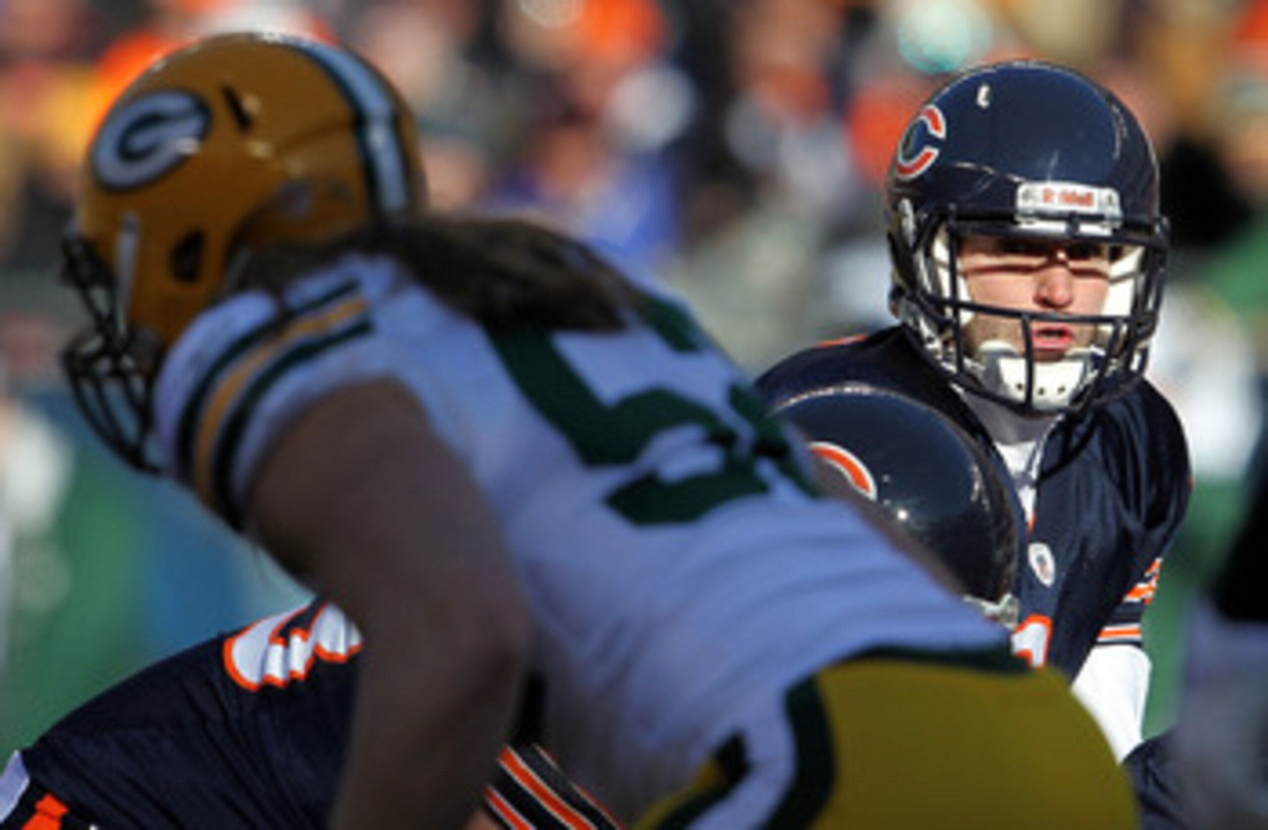 CHICAGO, IL - JANUARY 23:  Quarterback Jay Cutler #6 of the Chicago Bears looks on from under center while taking on the Green Bay Packers in the NFC Championship Game at Soldier Field on January 23, 2011 in Chicago, Illinois.  (Photo by Jamie Squire/Gett