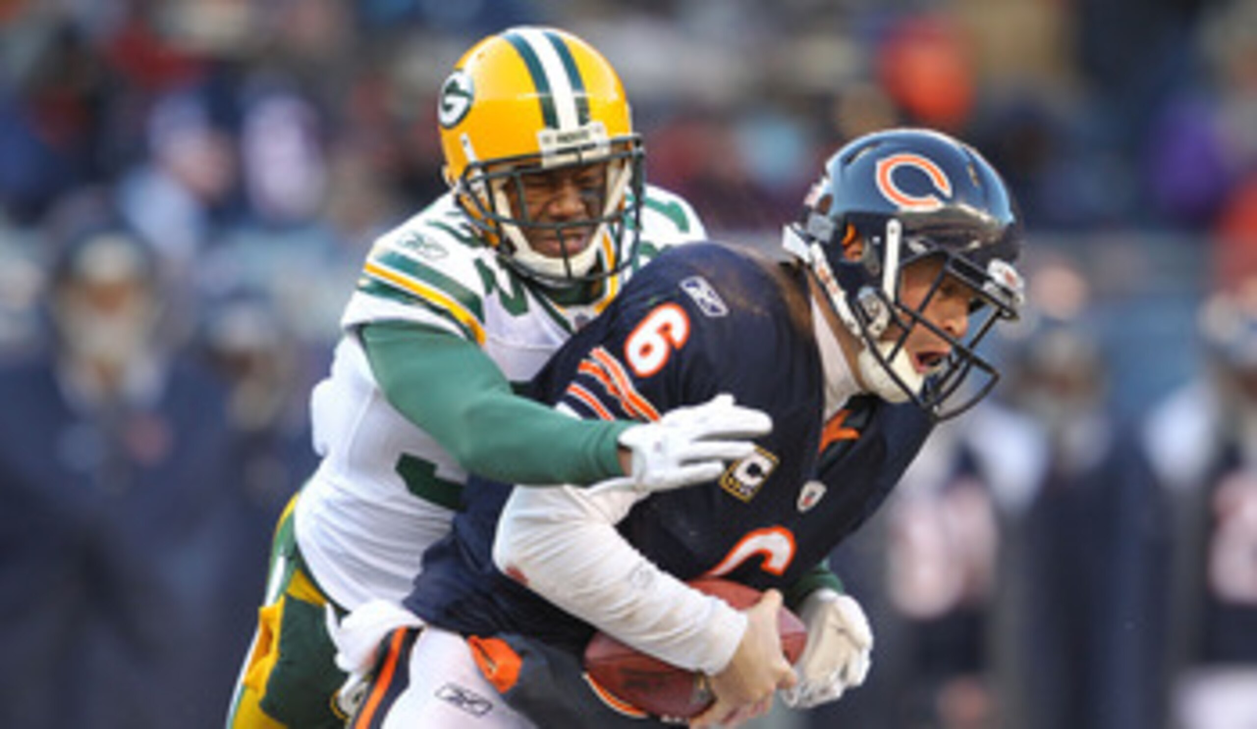 CHICAGO, IL - JANUARY 23:  Sam Shields #37 of the Green Bay Packers sacks quarterback Jay Cutler #6 of the Chicago Bears in the second quarter in the NFC Championship Game at Soldier Field on January 23, 2011 in Chicago, Illinois.  (Photo by Andy Lyons/Ge