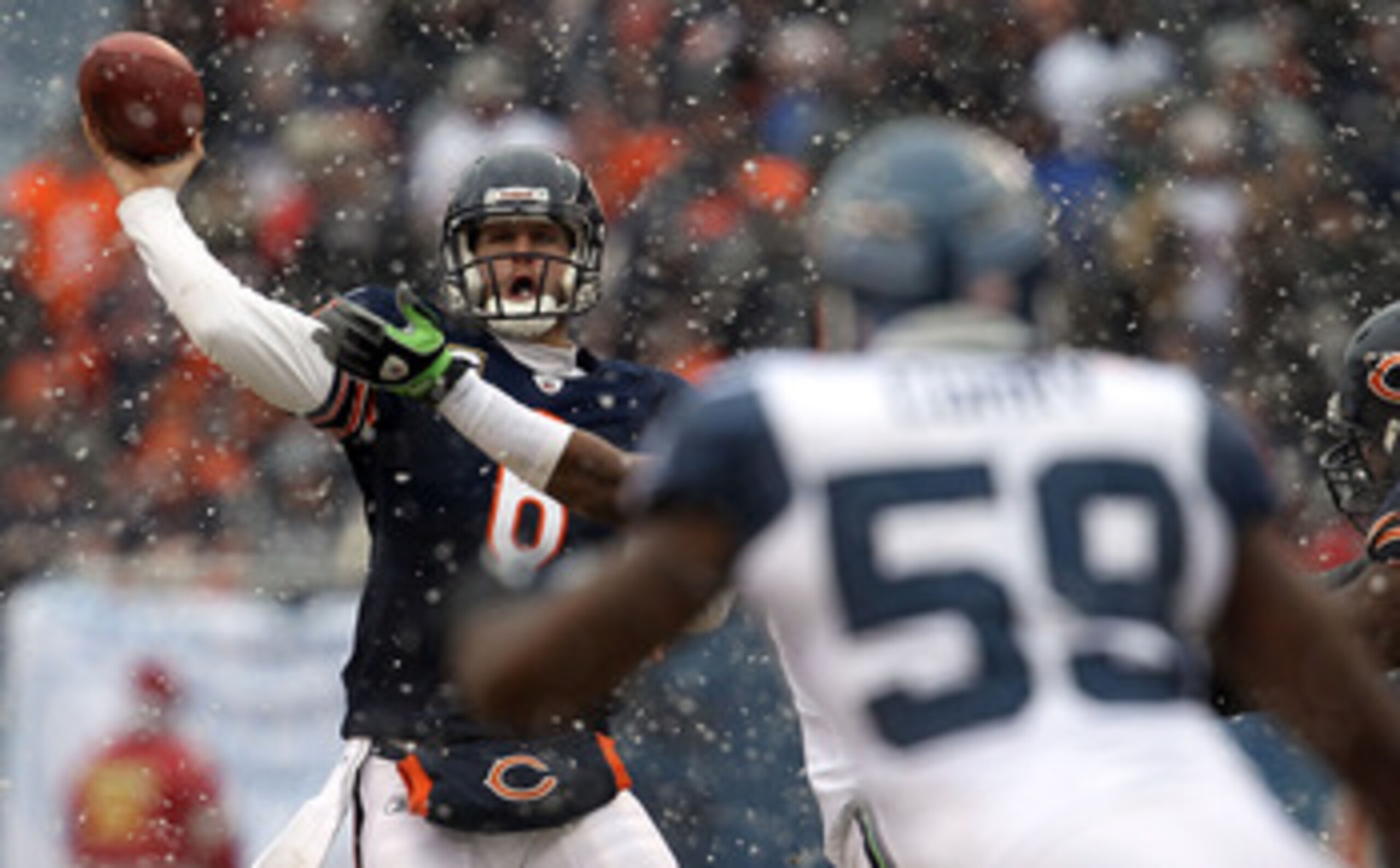 CHICAGO, IL - JANUARY 16:  Quarterback Jay Cutler #6 of the Chicago Bears throws the ball in the second quarter against the Seattle Seahawks in the 2011 NFC divisional playoff game at Soldier Field on January 16, 2011 in Chicago, Illinois.  (Photo by Jona