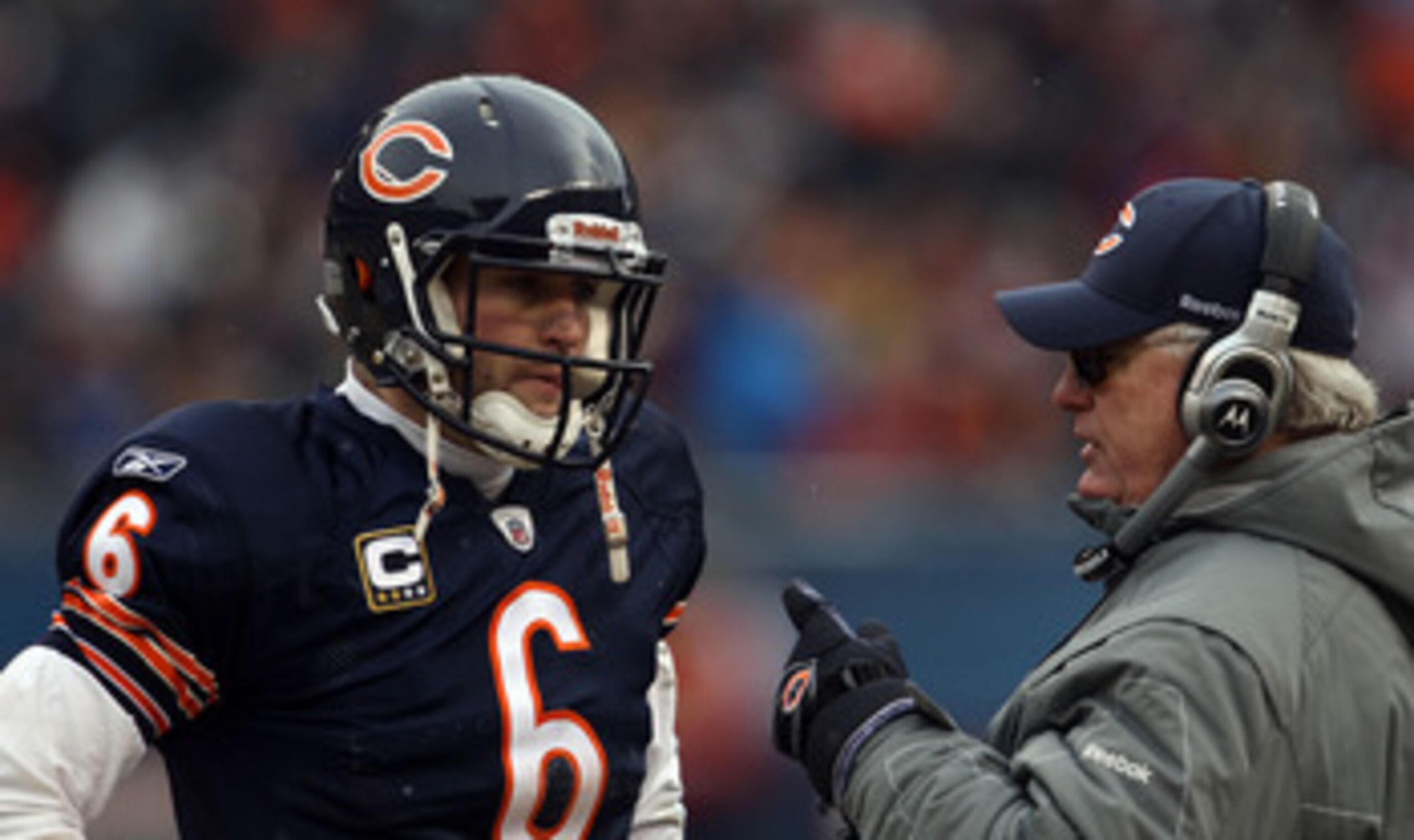 CHICAGO, IL - JANUARY 16:  Quarterback Jay Cutler #6 of the Chicago Bears talks with offensive coordinator Mike Martz in the second half against the Seattle Seahawks in the 2011 NFC divisional playoff game at Soldier Field on January 16, 2011 in Chicago, 