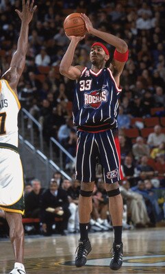 23 Nov 2001:  Eddie Griffen #33 of the Houston Rockets looks to pass the ball during the game against the Seattle SuperSonics at the Key Arena in Seattle, Washington. The Sonics defeated the Rockets 99-81. NOTE TO USER: User expressly acknowledges and agr