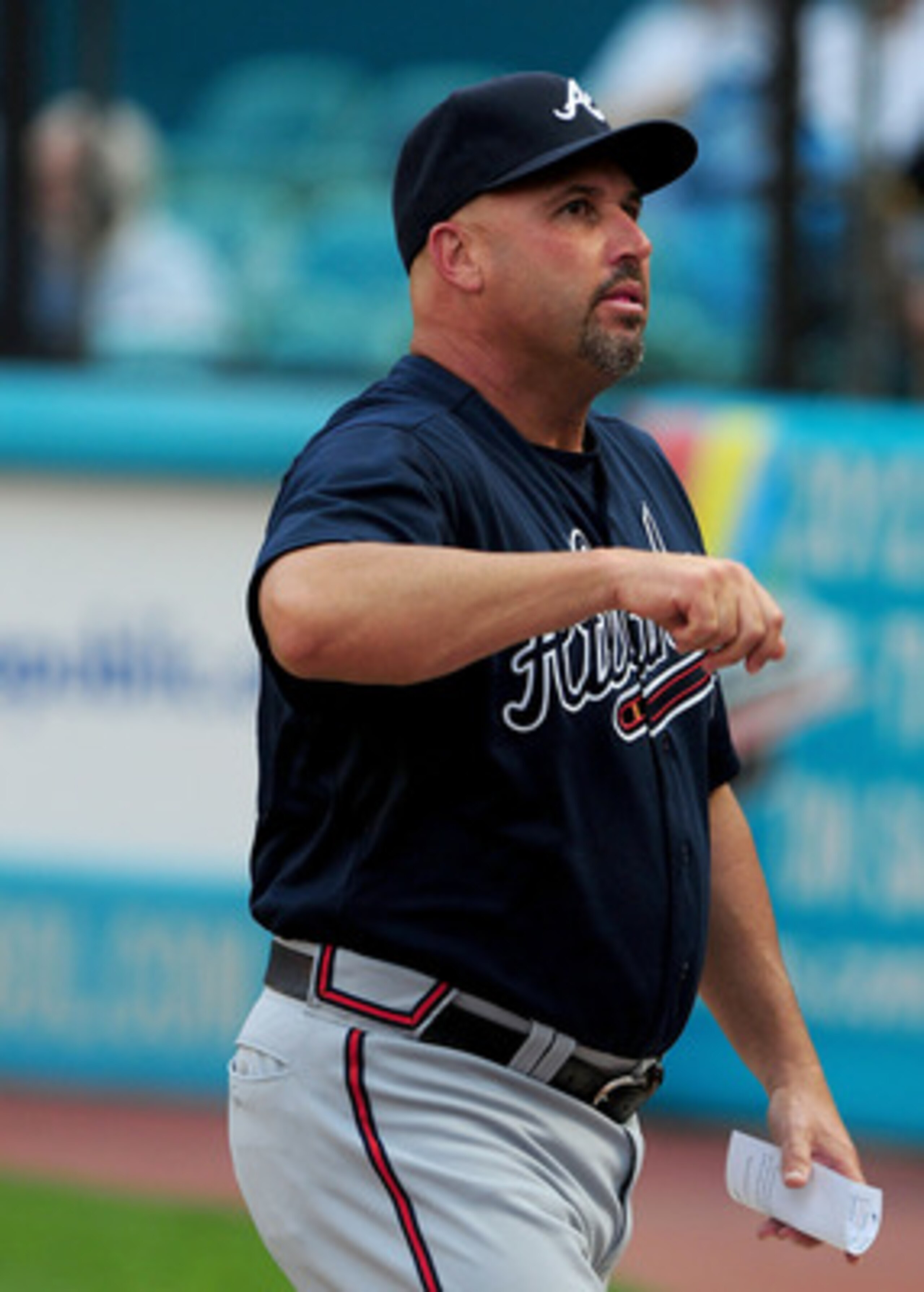 MIAMI GARDENS, FL - JUNE 09: Manager Freddie Gonzalez walks back to the dug out during a game against the Florida Marlins at Sun Life Stadium on June 9, 2011 in Miami Gardens, Florida.  (Photo by Marc Serota/Getty Images)