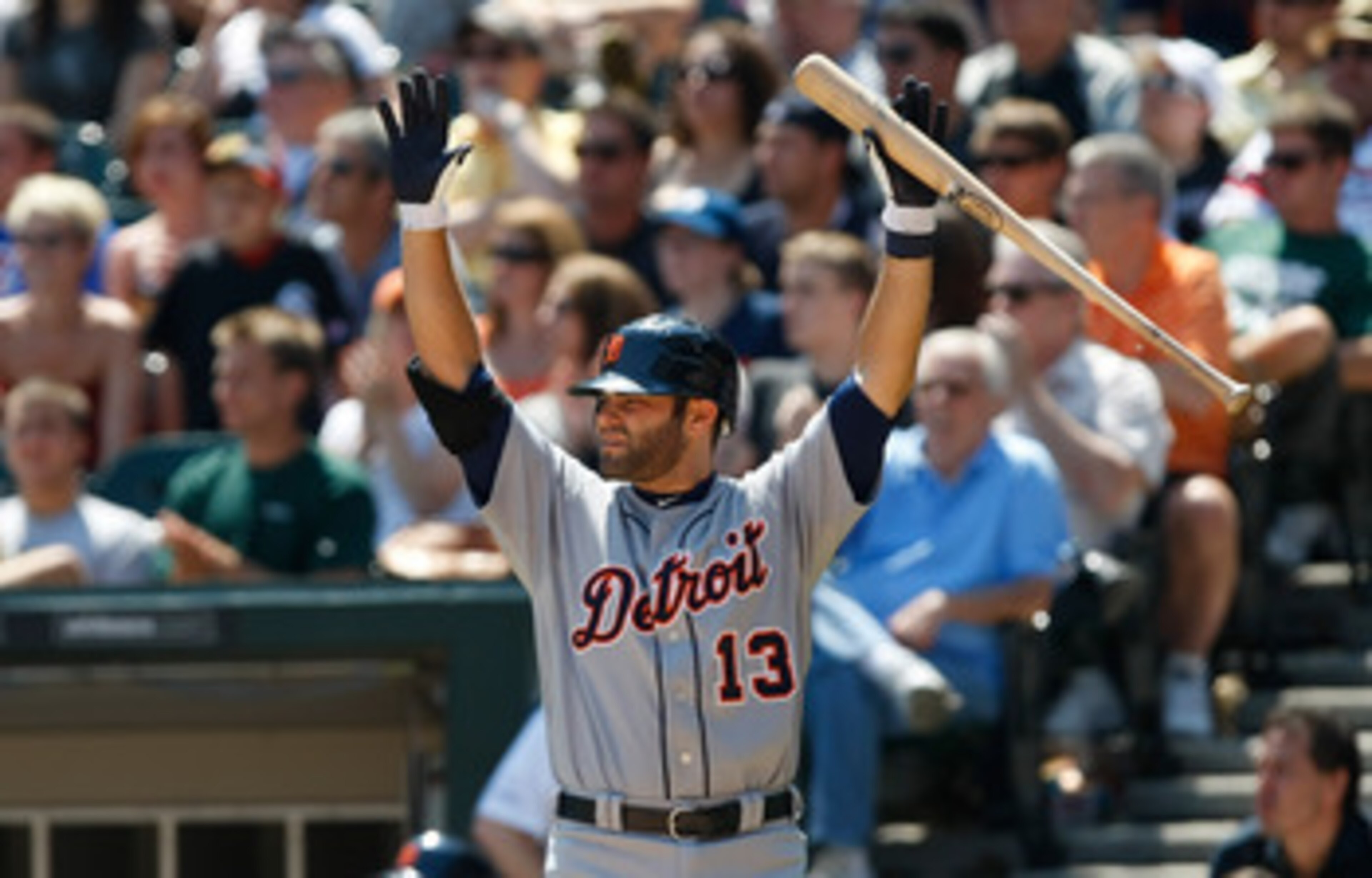 CHICAGO, IL- JUNE 5: Alex Avila #13 of the Detroit Tigers raises his arms at home plate against the Chicago White Sox at U.S. Cellular Field on June 5, 2011 in Chicago, Illinois. (Photo by Scott Boehm/Getty Images)