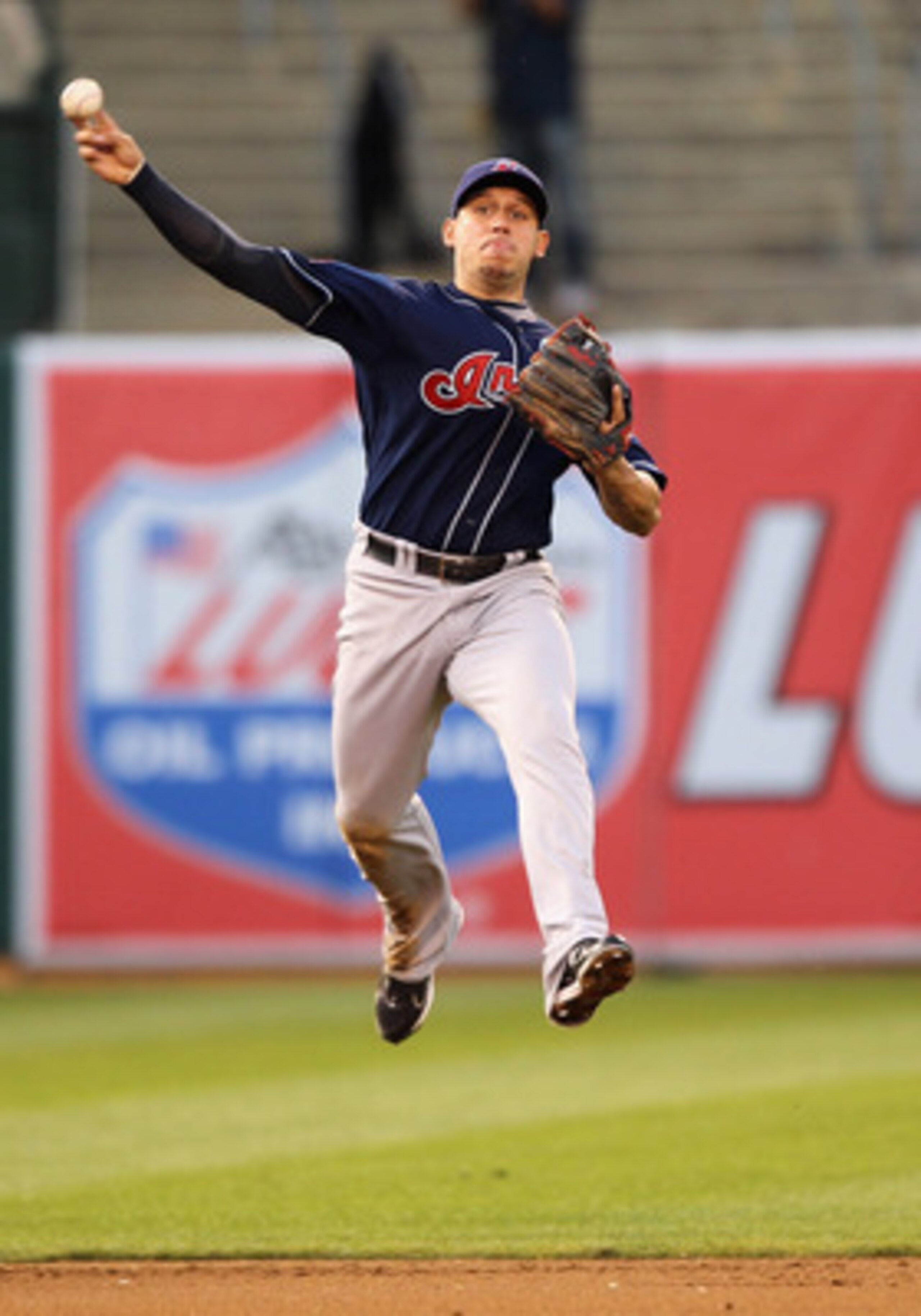 OAKLAND, CA - MAY 03: Asdrubal Cabrera #13 of the Cleveland Indians attempts to throw out Hideki Matsui #55 of the Oakland Athletics at Oakland-Alameda County Coliseum on May 3, 2011 in Oakland, California. Matsui was safe at first base. (Photo by Ezra OAKLAND, CA - MAY 03: Asdrubal Cabrera #13 of the Cleveland Indians attempts to throw out Hideki Matsui #55 of the Oakland Athletics at Oakland-Alameda County Coliseum on May 3, 2011 in Oakland, California. Matsui was safe at first base. (Photo by Ezra