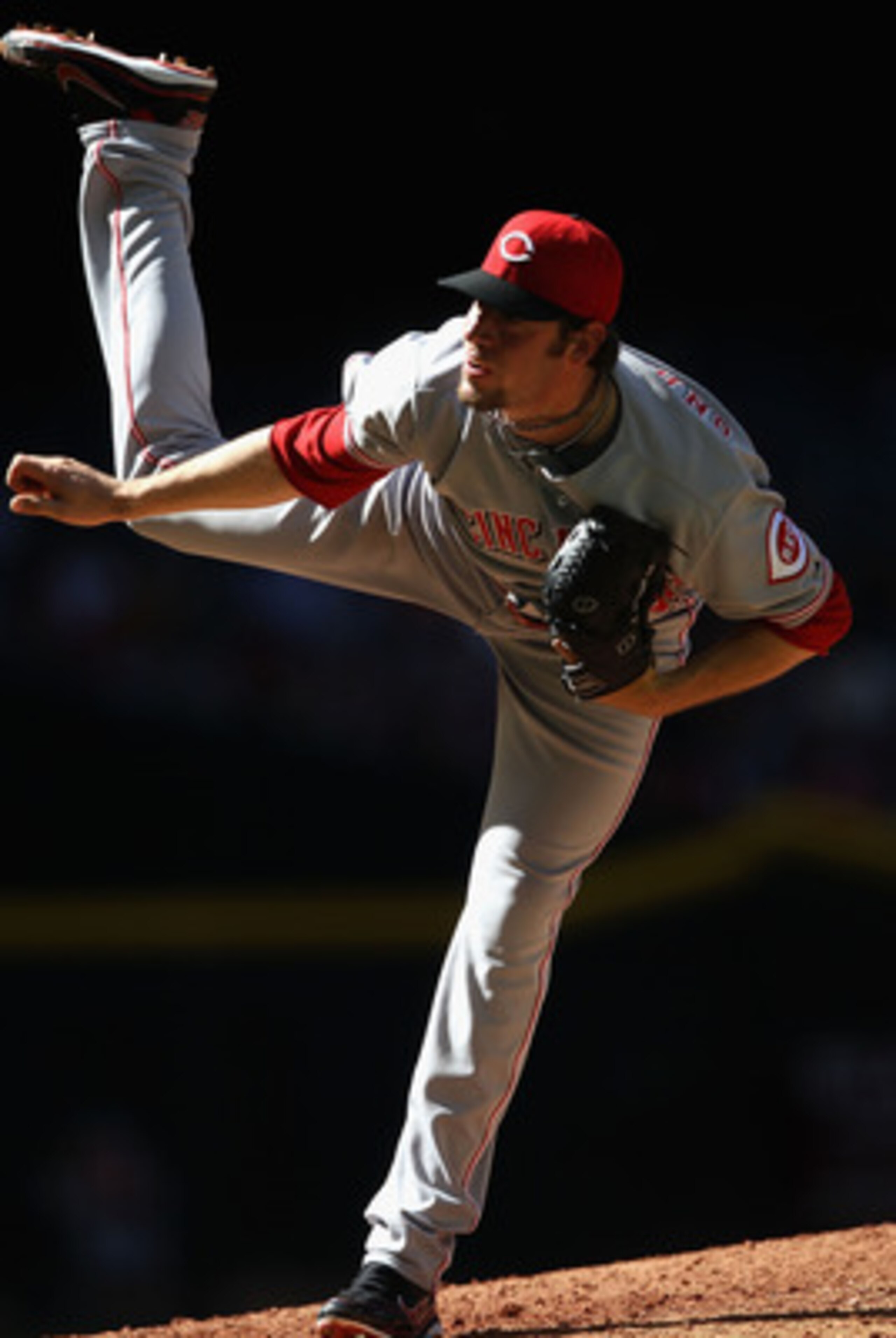 PHOENIX, AZ - APRIL 10:  Relief pitcher Logan Ondrusek #66 of the Cincinnati Reds pitches against the Arizona Diamondbacks during the Major League Baseball game at Chase Field on April 10, 2011 in Phoenix, Arizona.  The Diamondbacks defeated the Reds 10-8