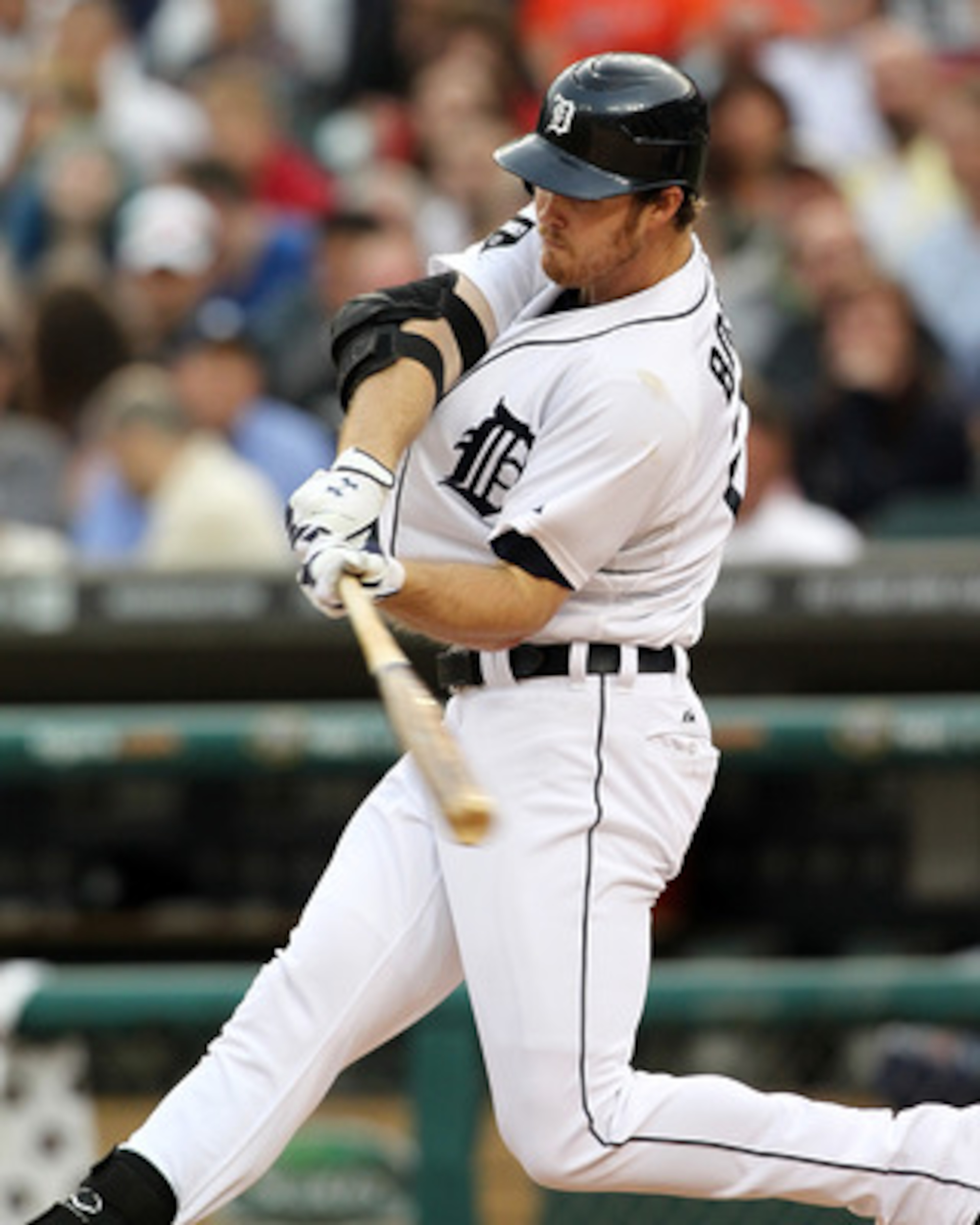 DETROIT, MI - JUNE 09: Brennan Boesch #26 of the Detroit Tigers swings and hits a home run in a MLB game against the Seattle Mariners at Comerica Park on June 9, 2011 in Detroit, Michigan.  The Tigers defeated the Mariners 4-1  (Photo by Dave Reginek/Gett