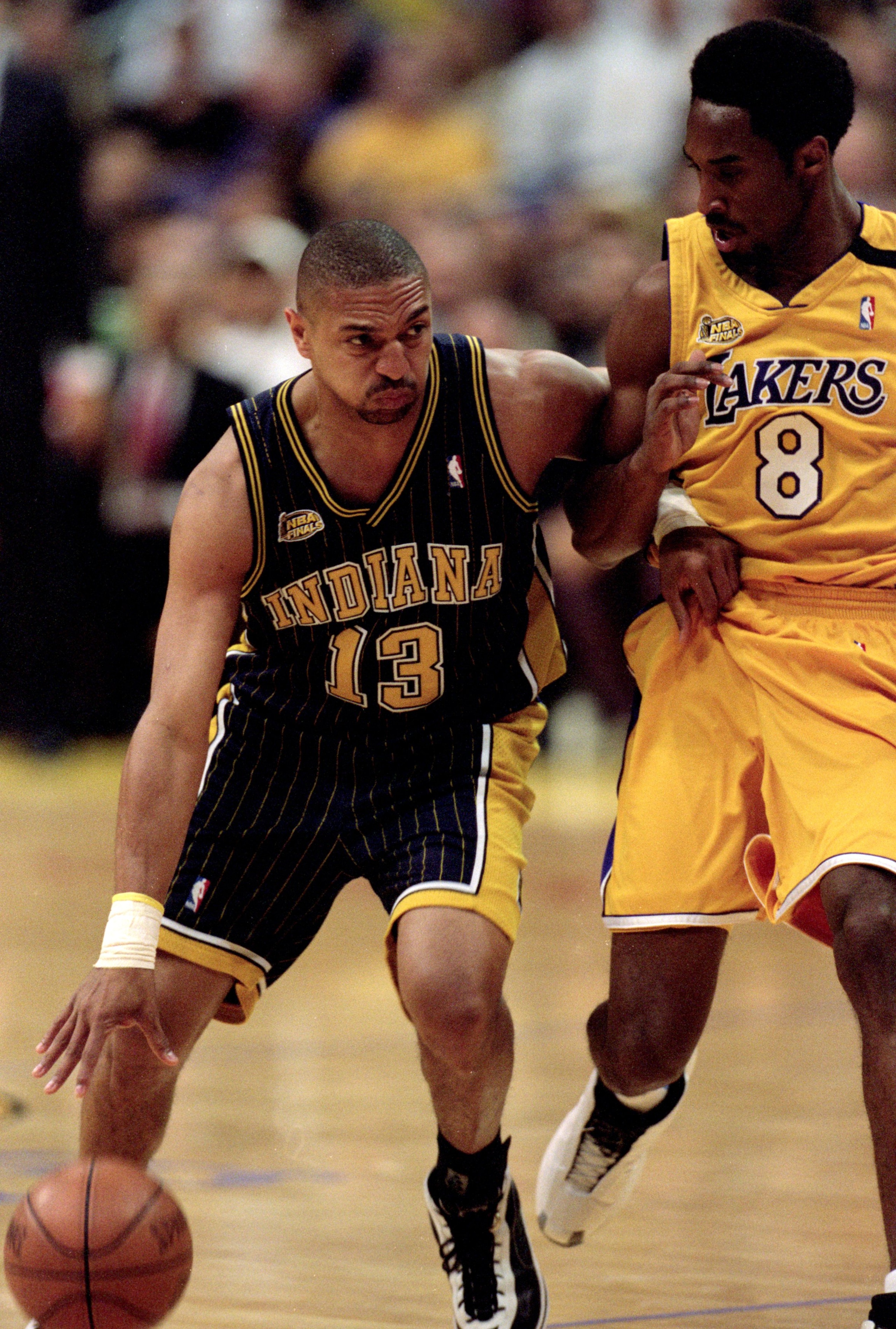 19 Jun 2000: Mark Jackson #13 of the Indiana Pacers dribbles the ball as he is guarded by Kobe Bryant #8 of the Los Angeles Lakers  during the NBA Finals Game 6 at the Staples Center in Los Angeles, California.  The Lakers defeated the Pacers in 116-111.