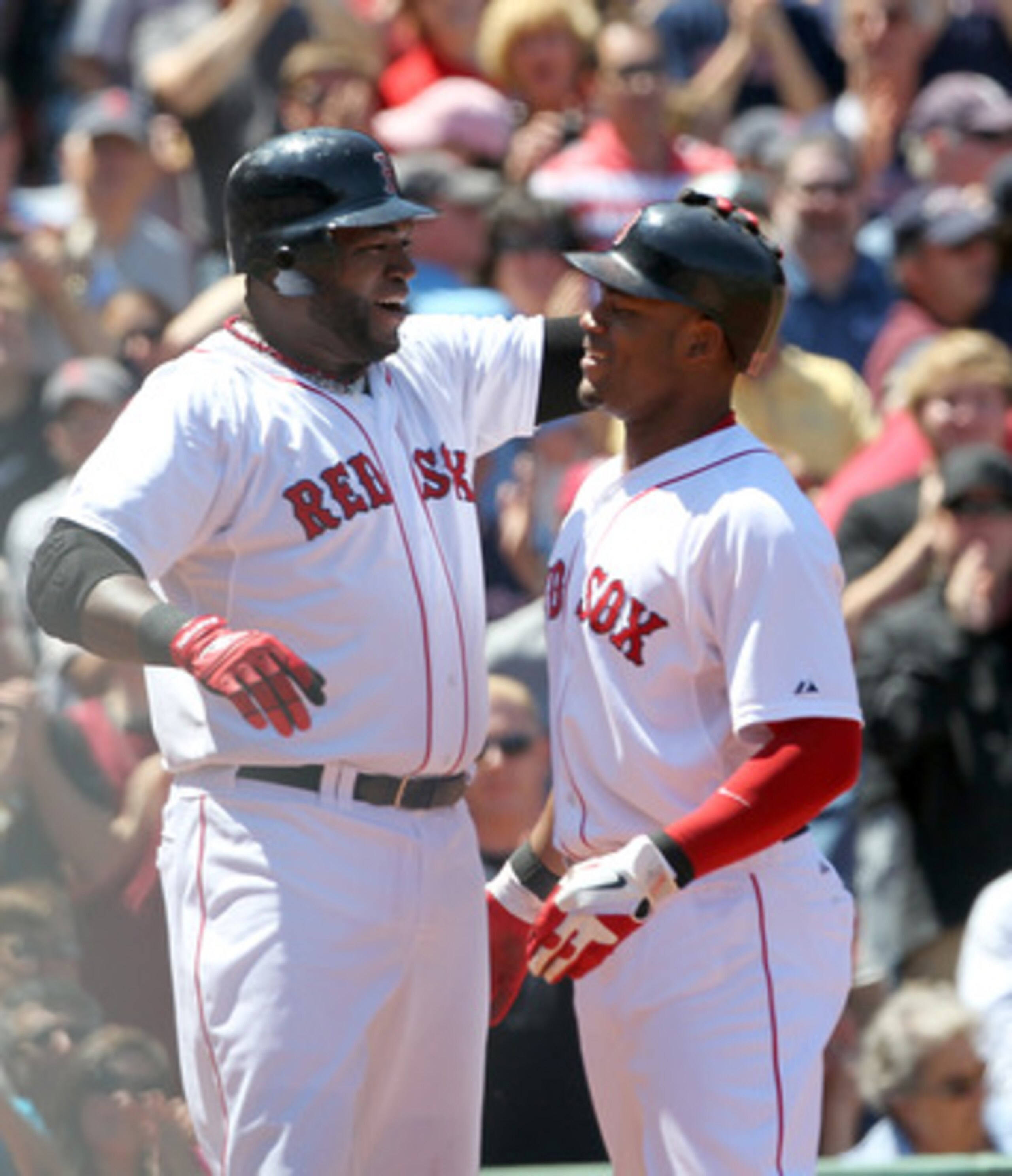 BOSTON, MA - JUNE 5: Carl Crawford #13 of the Boston Red Sox celebrates his three-run home run with teammate David Ortiz #34 against the Oakland Athletics at Fenway Park on June 5, 2011 in Boston, Massachusetts. (Photo by Jim Rogash/Getty Images) BOSTON, MA - JUNE 5: Carl Crawford #13 of the Boston Red Sox celebrates his three-run home run with teammate David Ortiz #34 against the Oakland Athletics at Fenway Park on June 5, 2011 in Boston, Massachusetts. (Photo by Jim Rogash/Getty Images)