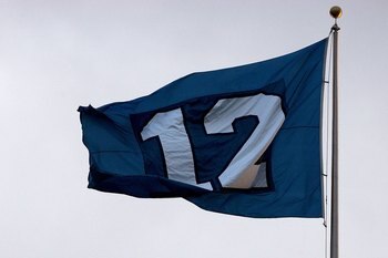 SEATTLE - JANUARY 22:  A flag representing the '12th man' in honor of Seattle Seahawks fans flies at the NFC Championship Game between the Seattle Seahawks and the Carolina Panthers at Qwest Stadium on January 22, 2006 in Seattle, Washington.  (Photo by H