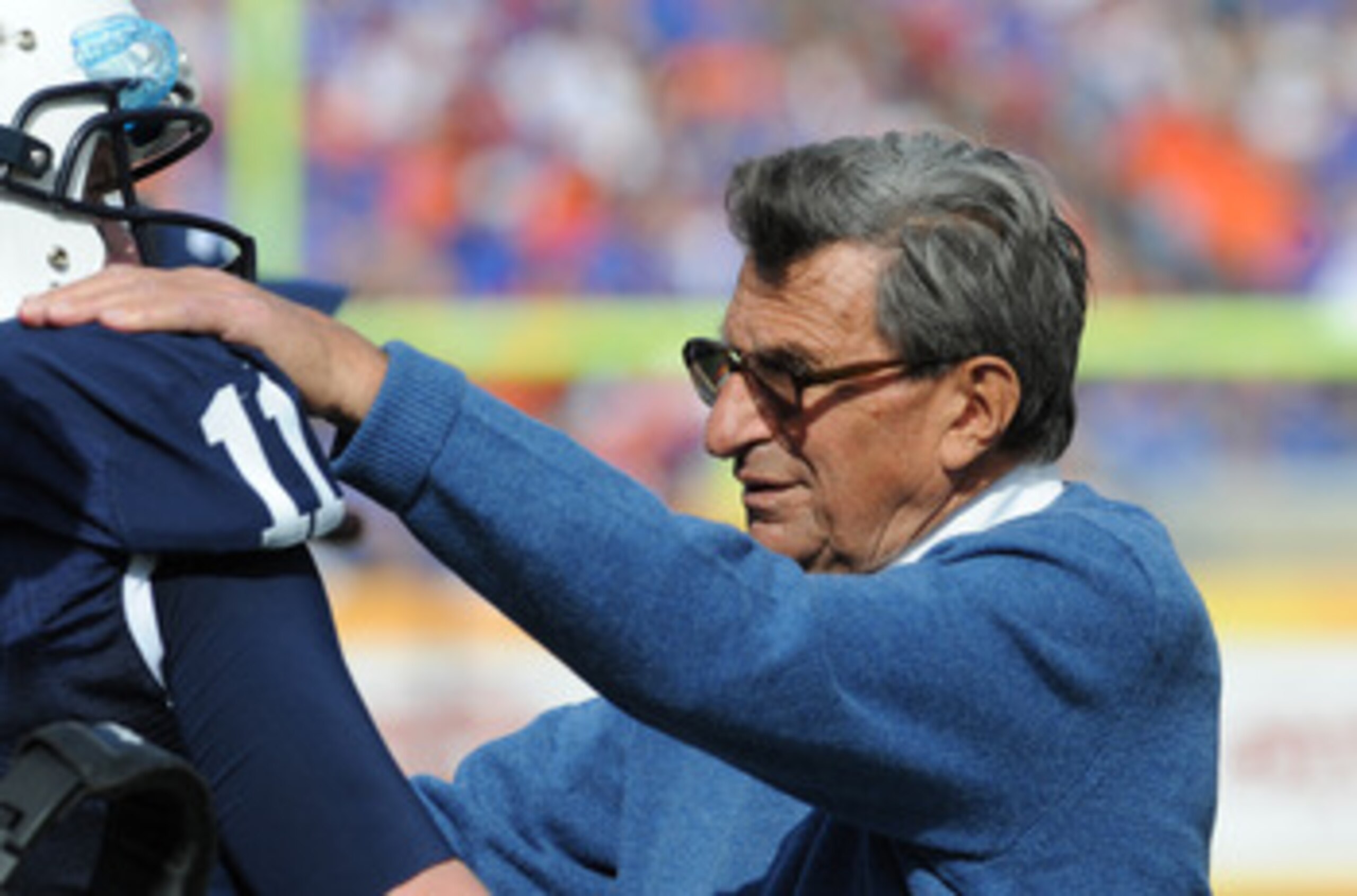 TAMPA, FL - JANUARY 1:  Coach Joe Paterno of the Penn State Nittany Lions directs play of quarterback Matt McGloin #11 against the Florida Gators January 1, 2010 in the 25th Outback Bowl at Raymond James Stadium in Tampa, Florida.  (Photo by Al Messerschm