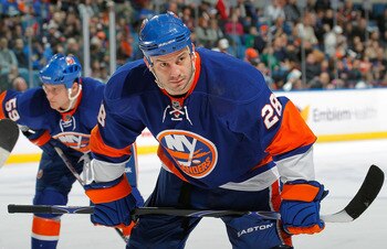 UNIONDALE, NY - FEBRUARY 21:  Zenon Konopka #28 of the New York Islanders waits for a faceoff during an NHL hockey game against the Florida Panthers at the Nassau Coliseum on February 21, 2011 in Uniondale, New York.  (Photo by Paul Bereswill/Getty Images