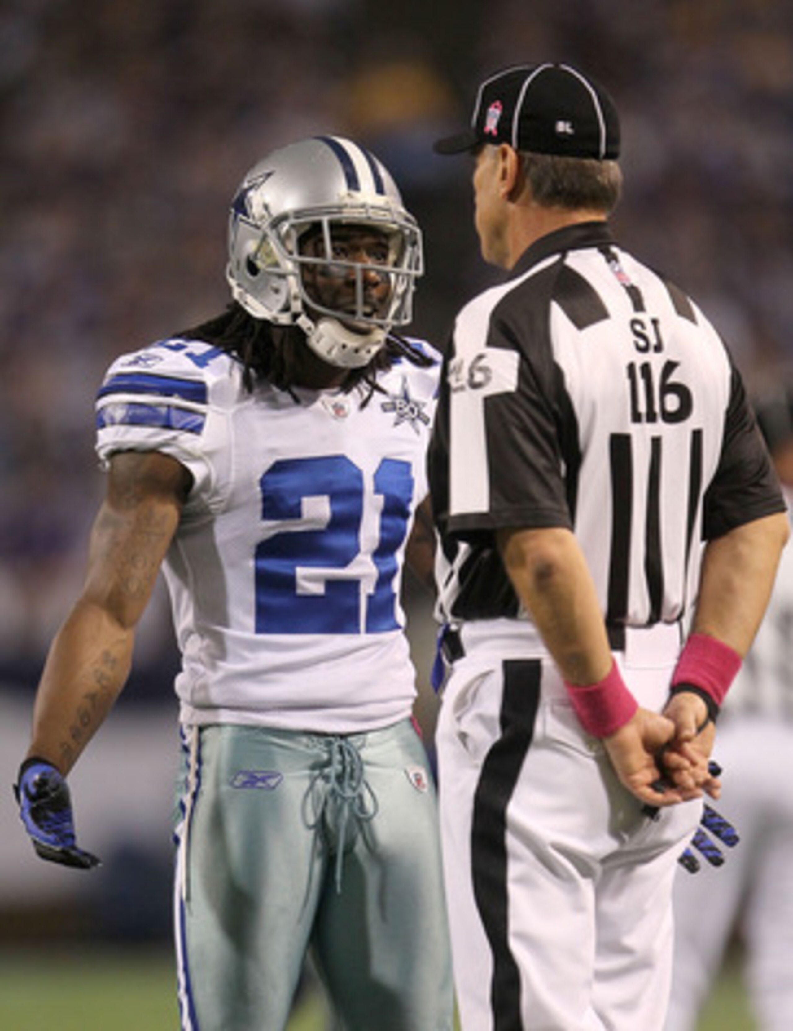 MINNEAPOLIS - OCTOBER 17:  Mike Jenkins #21 of the Dallas Cowboys argues with the referee during the game against the Minnesota Vikings at Mall of America Field on October 17, 2010 in Minneapolis, Minnesota.  (Photo by Jeff Gross/Getty Images)
