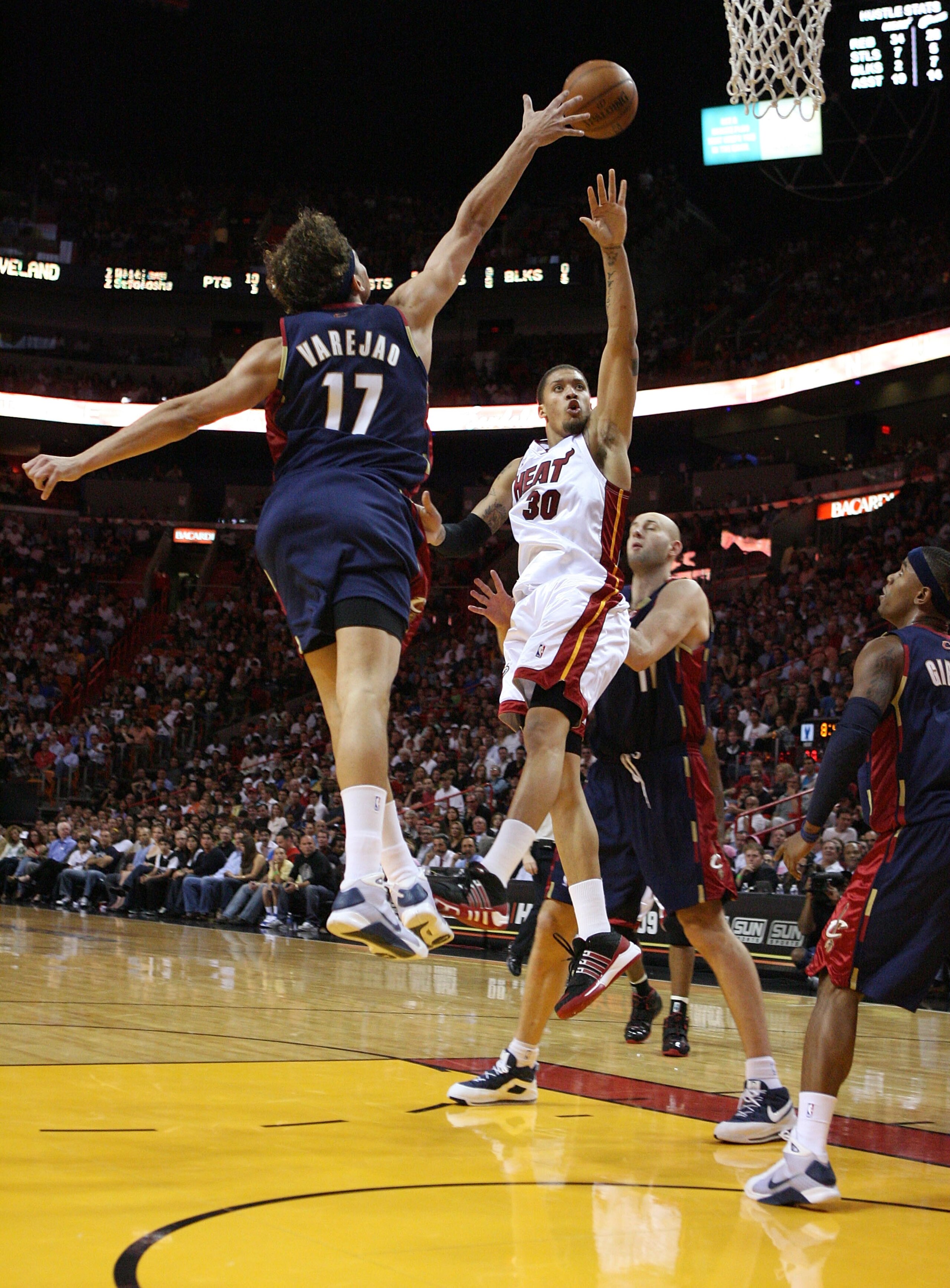 MIAMI - DECEMBER 30: Michael Beasley #30 of the Miami Heat has his shot blocked by Anderson Verejao #17 of the Cleveland Cavaliers at American Airlines Arena on December 30, 2008 in Miami, Florida. The Heat defeated the Cavaliers 104-95. NOTE TO USER: Us MIAMI - DECEMBER 30: Michael Beasley #30 of the Miami Heat has his shot blocked by Anderson Verejao #17 of the Cleveland Cavaliers at American Airlines Arena on December 30, 2008 in Miami, Florida. The Heat defeated the Cavaliers 104-95. NOTE TO USER: Us