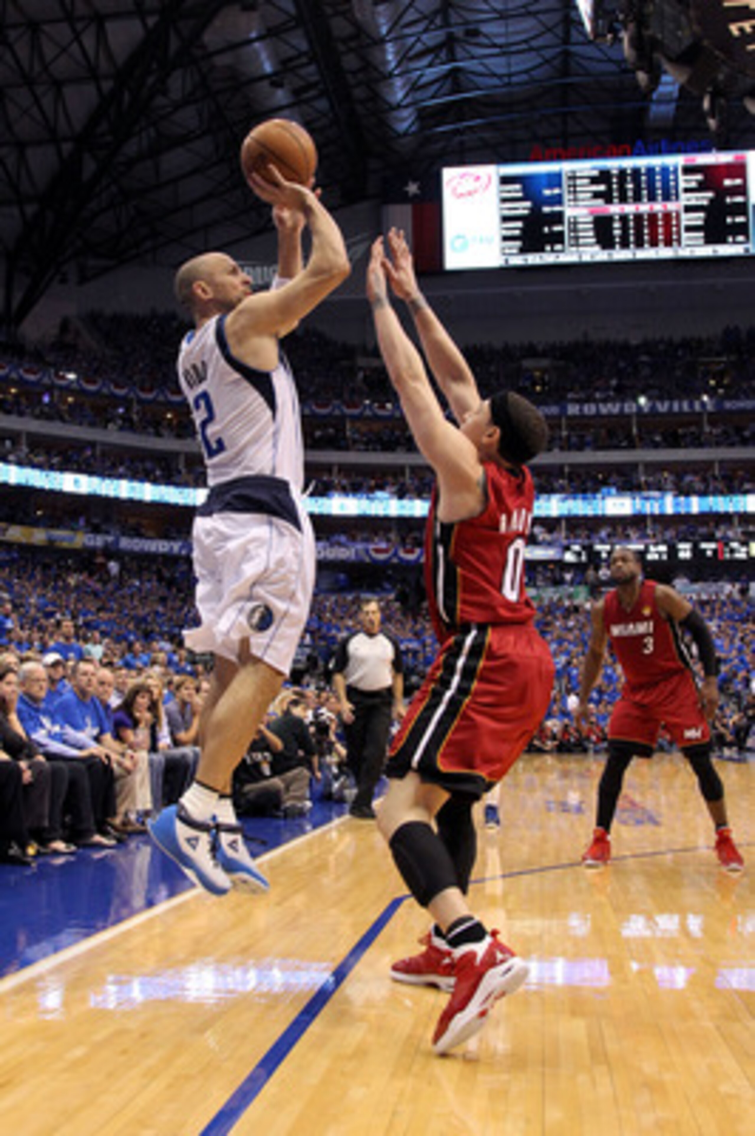 DALLAS, TX - JUNE 07:  Jason Kidd #2 of the Dallas Mavericks attempts a shot against the Mike Bibby #0 of the Miami Heat in Game Four of the 2011 NBA Finals at American Airlines Center on June 7, 2011 in Dallas, Texas. The Mavericks won 86-83. NOTE TO USE
