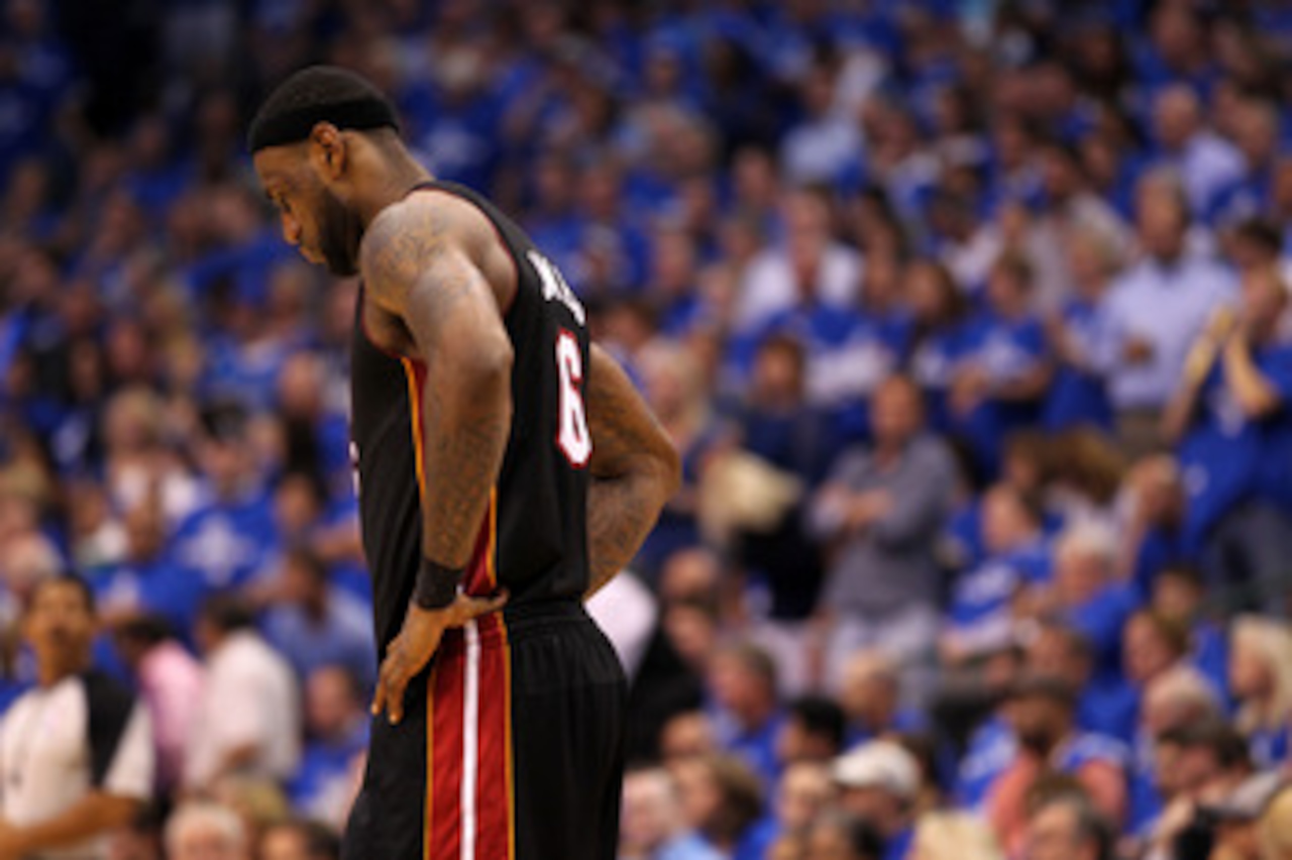 DALLAS, TX - JUNE 09: LeBron James #6 of the Miami Heat stands on the court with his head down against the Dallas Mavericks in the fourth quarter of Game Five of the 2011 NBA Finals at American Airlines Center on June 9, 2011 in Dallas, Texas. NOTE TO U DALLAS, TX - JUNE 09: LeBron James #6 of the Miami Heat stands on the court with his head down against the Dallas Mavericks in the fourth quarter of Game Five of the 2011 NBA Finals at American Airlines Center on June 9, 2011 in Dallas, Texas. NOTE TO U