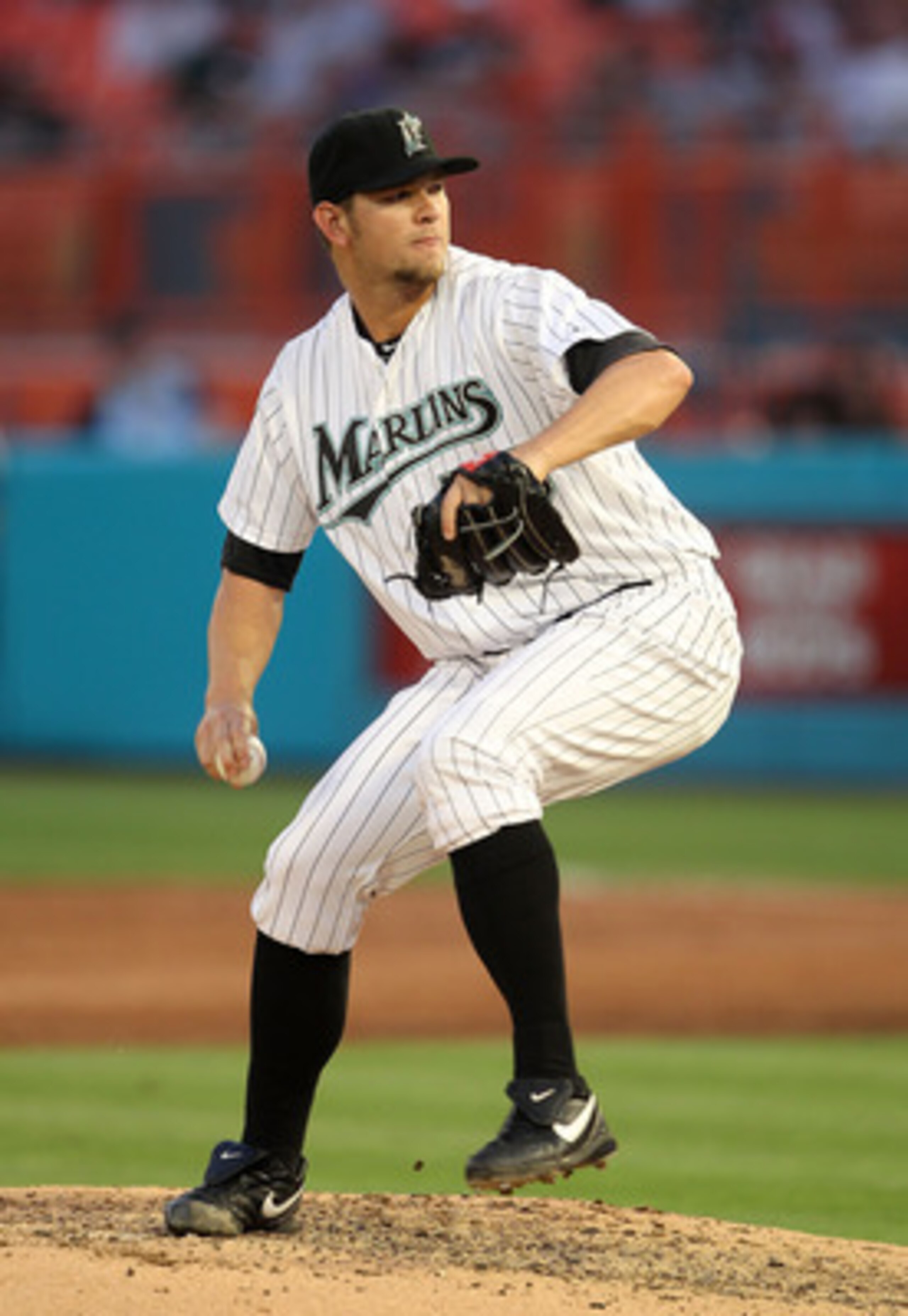 MIAMI GARDENS, FL - MAY 10:  Josh Johnson #55 of the Florida Marlins pitches during a game against the Philadelphia Phillies at Sun Life Stadium on May 10, 2011 in Miami Gardens, Florida.  (Photo by Mike Ehrmann/Getty Images)