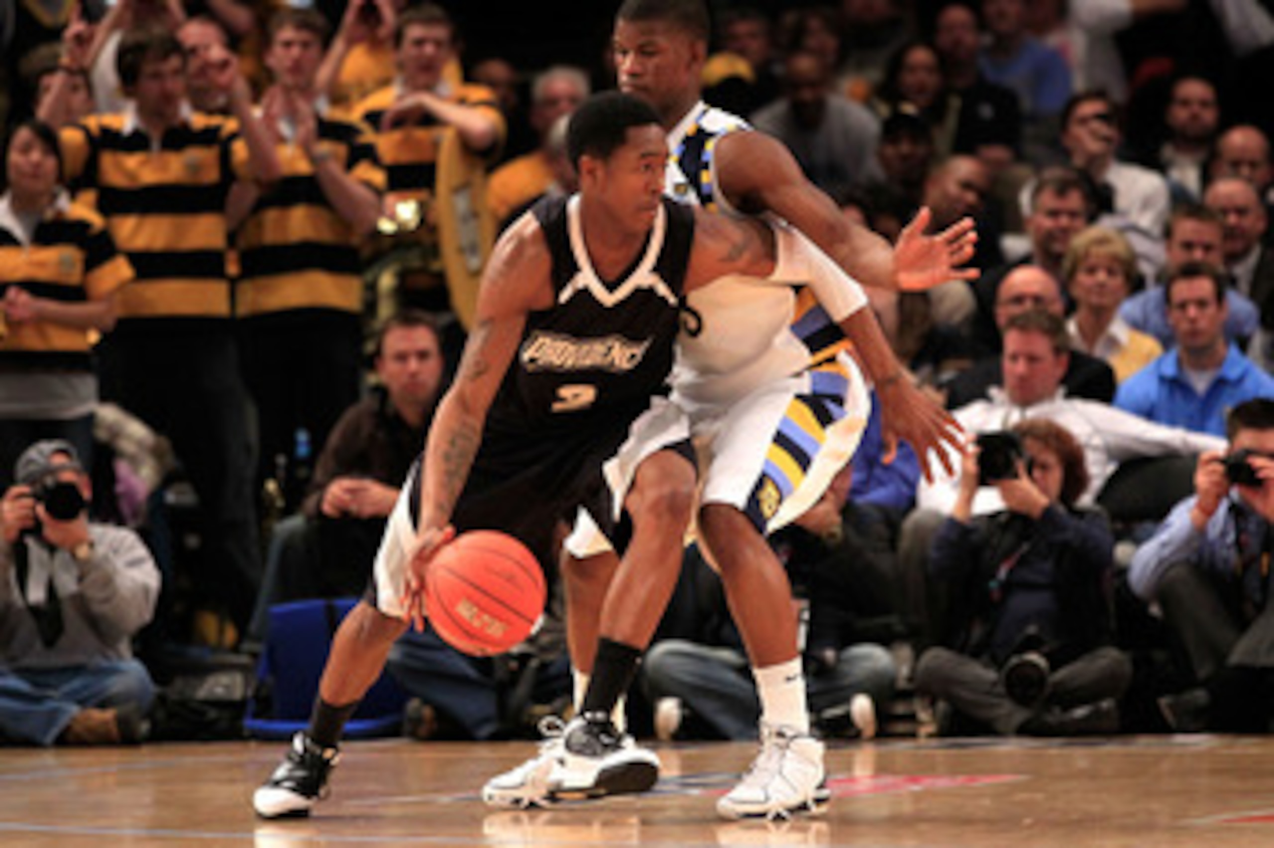 NEW YORK, NY - MARCH 08: Marshon Brooks #2 of the Providence Friars dribbles the ball against Jimmy Butler #33 of the Marquette Golden Eagles during the first round of the 2011 Big East Men's Basketball Tournament presented by American Eagle Outfitters at NEW YORK, NY - MARCH 08: Marshon Brooks #2 of the Providence Friars dribbles the ball against Jimmy Butler #33 of the Marquette Golden Eagles during the first round of the 2011 Big East Men's Basketball Tournament presented by American Eagle Outfitters at